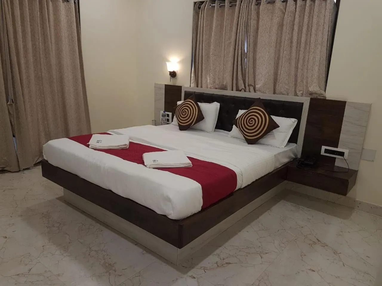 Bed in Hotel Grand Ganesha
