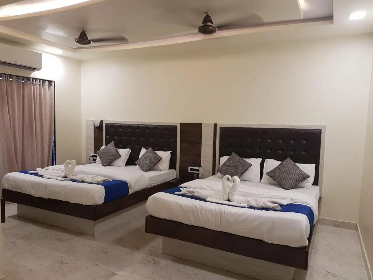 Bed in Hotel Grand Ganesha