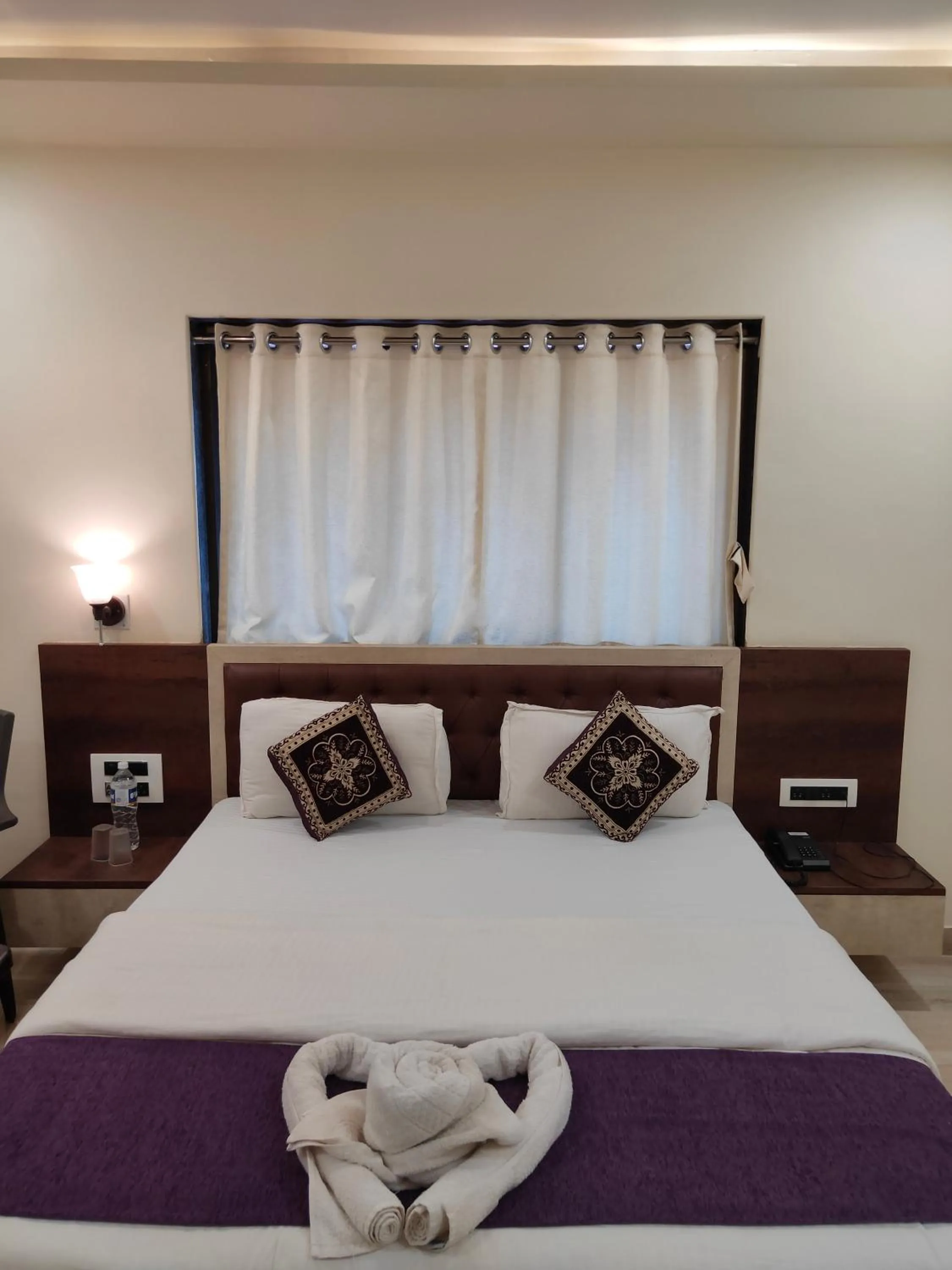 Bed in Hotel Grand Ganesha