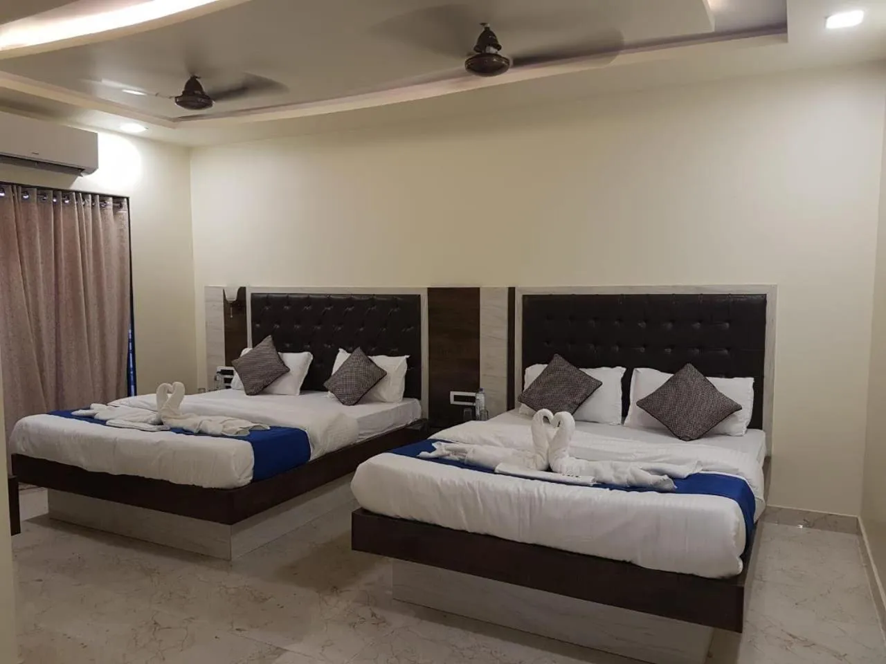 Bed in Hotel Grand Ganesha