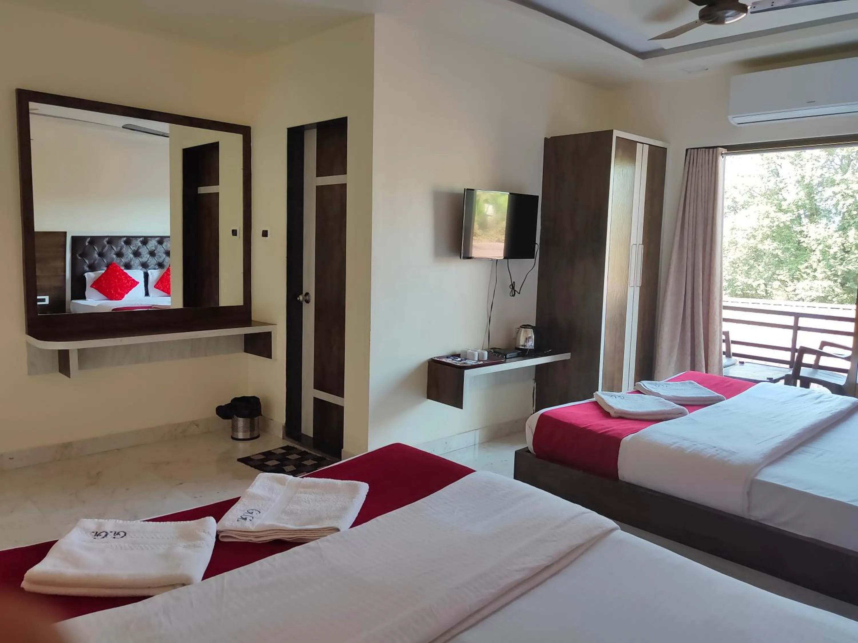 Bed in Hotel Grand Ganesha