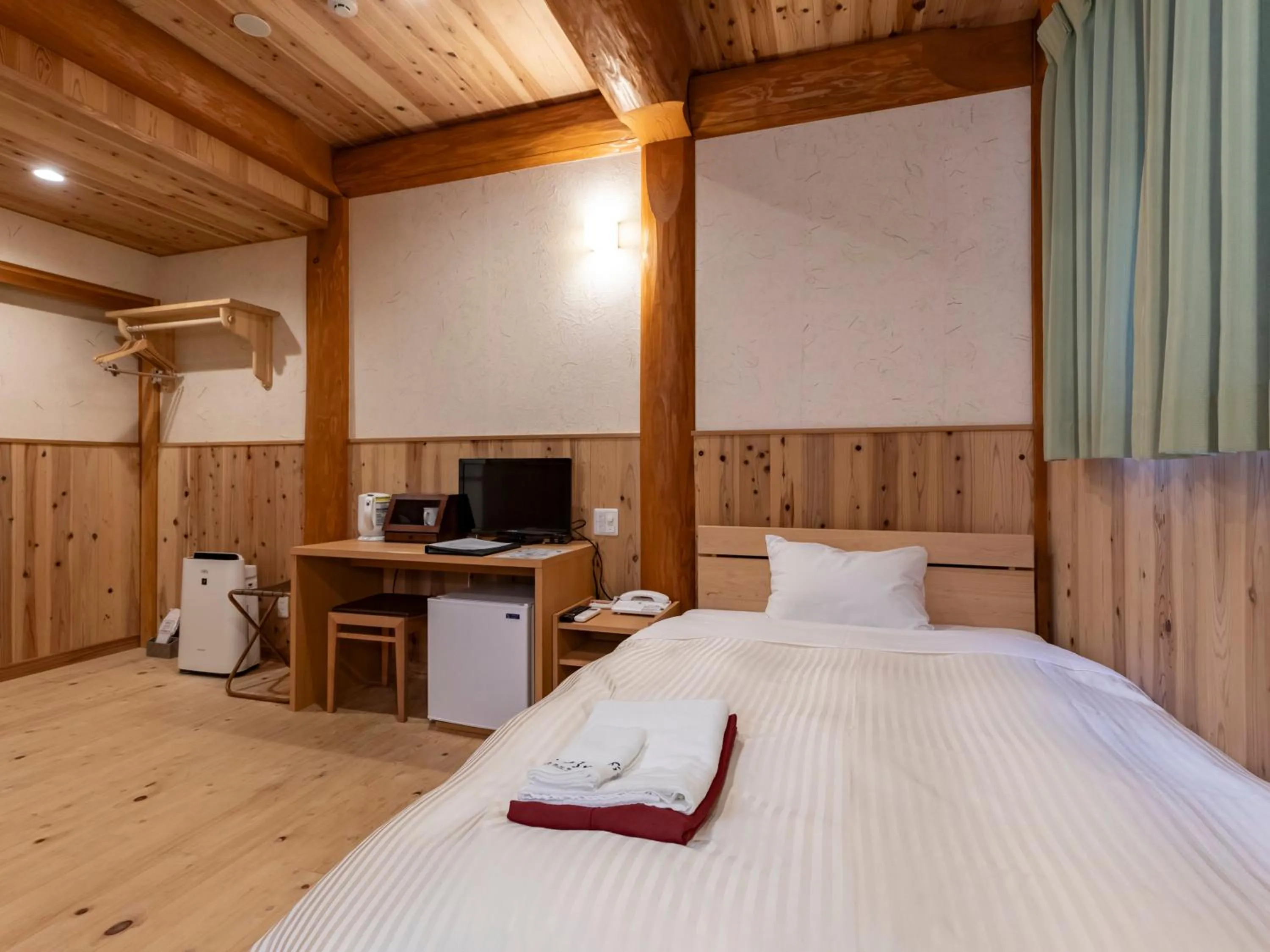 Photo of the whole room, Bed in Tennenonsen Harunonoyu
