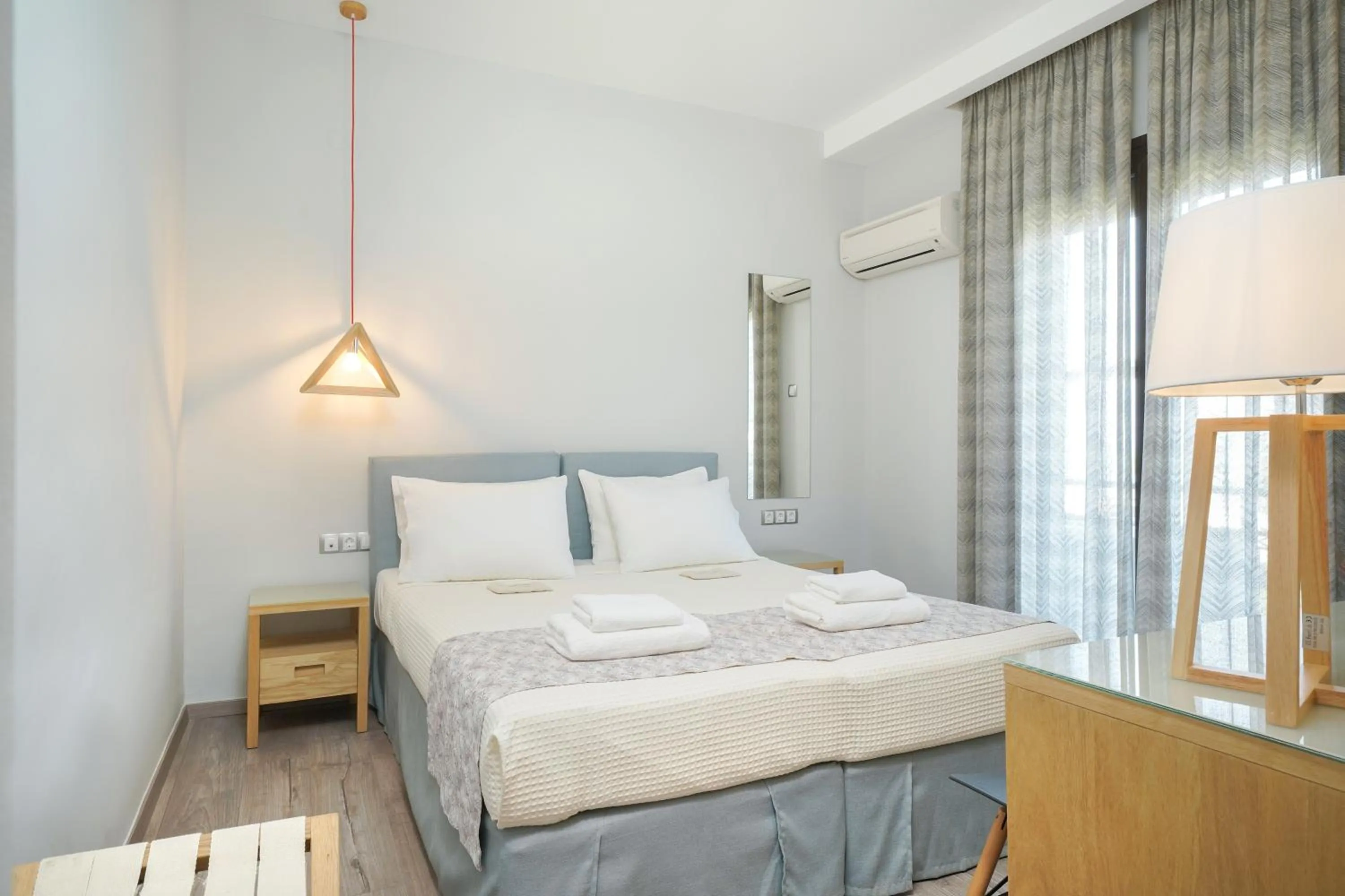 Bed in Kamelia & Semeli Hotel