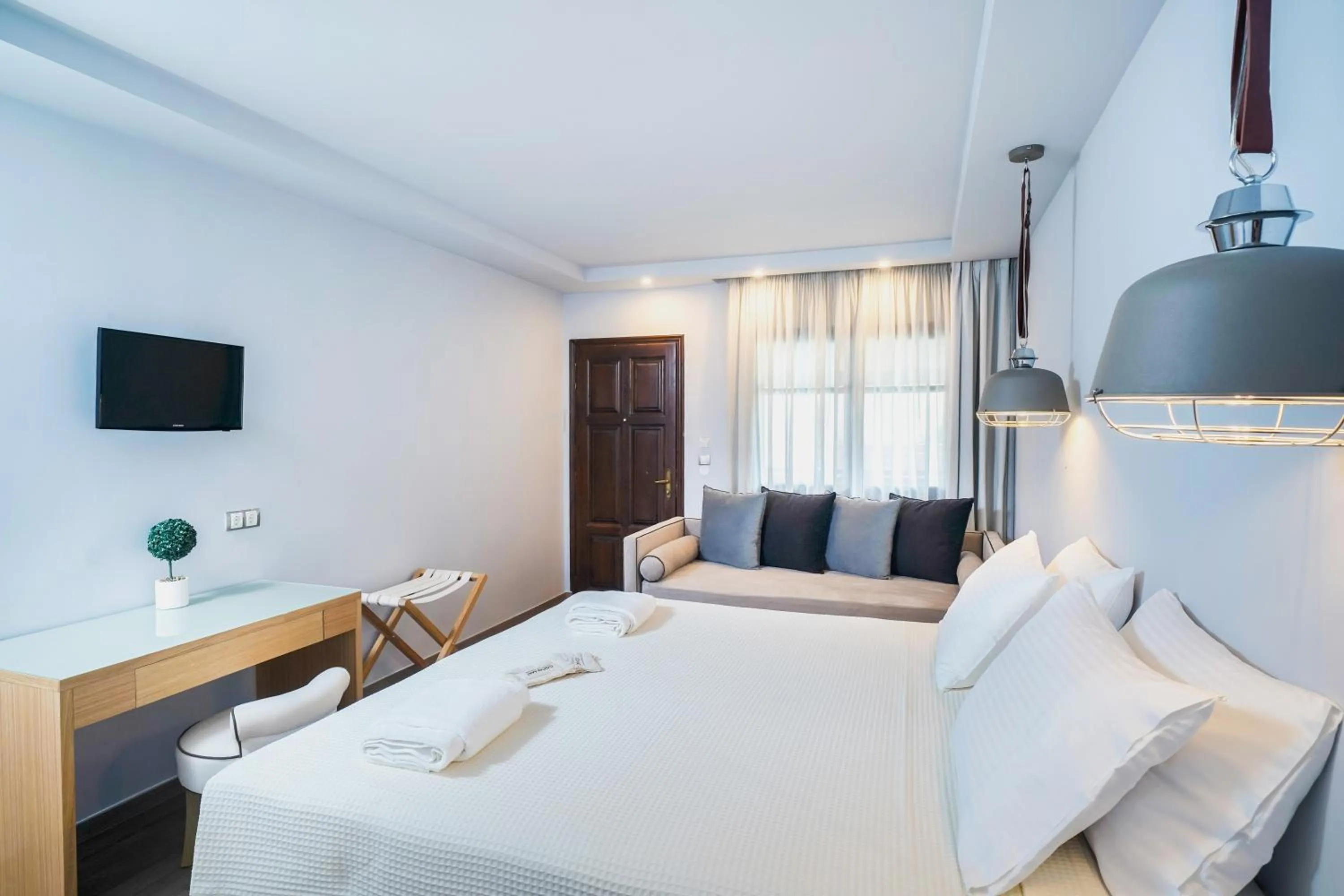 Bed in Kamelia & Semeli Hotel