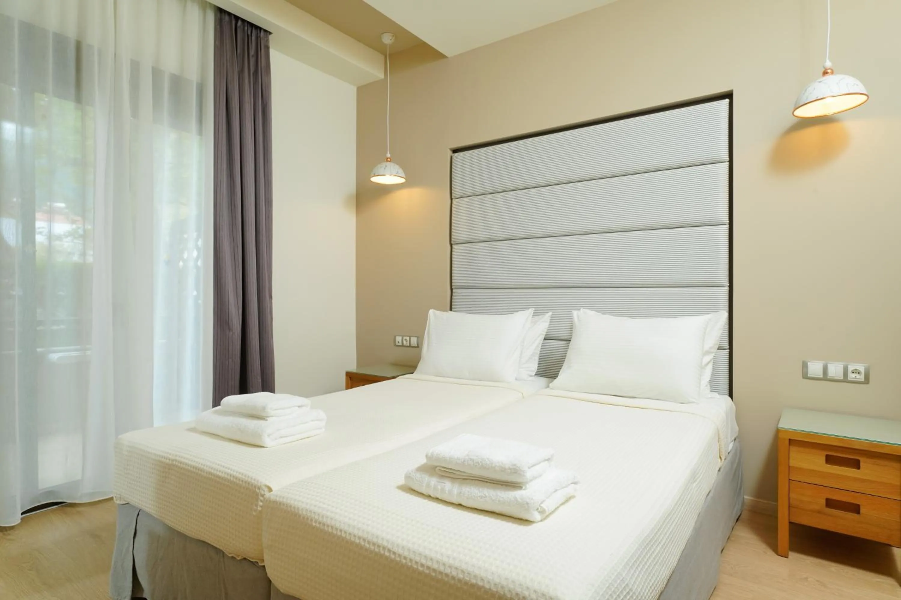 Bed in Kamelia & Semeli Hotel