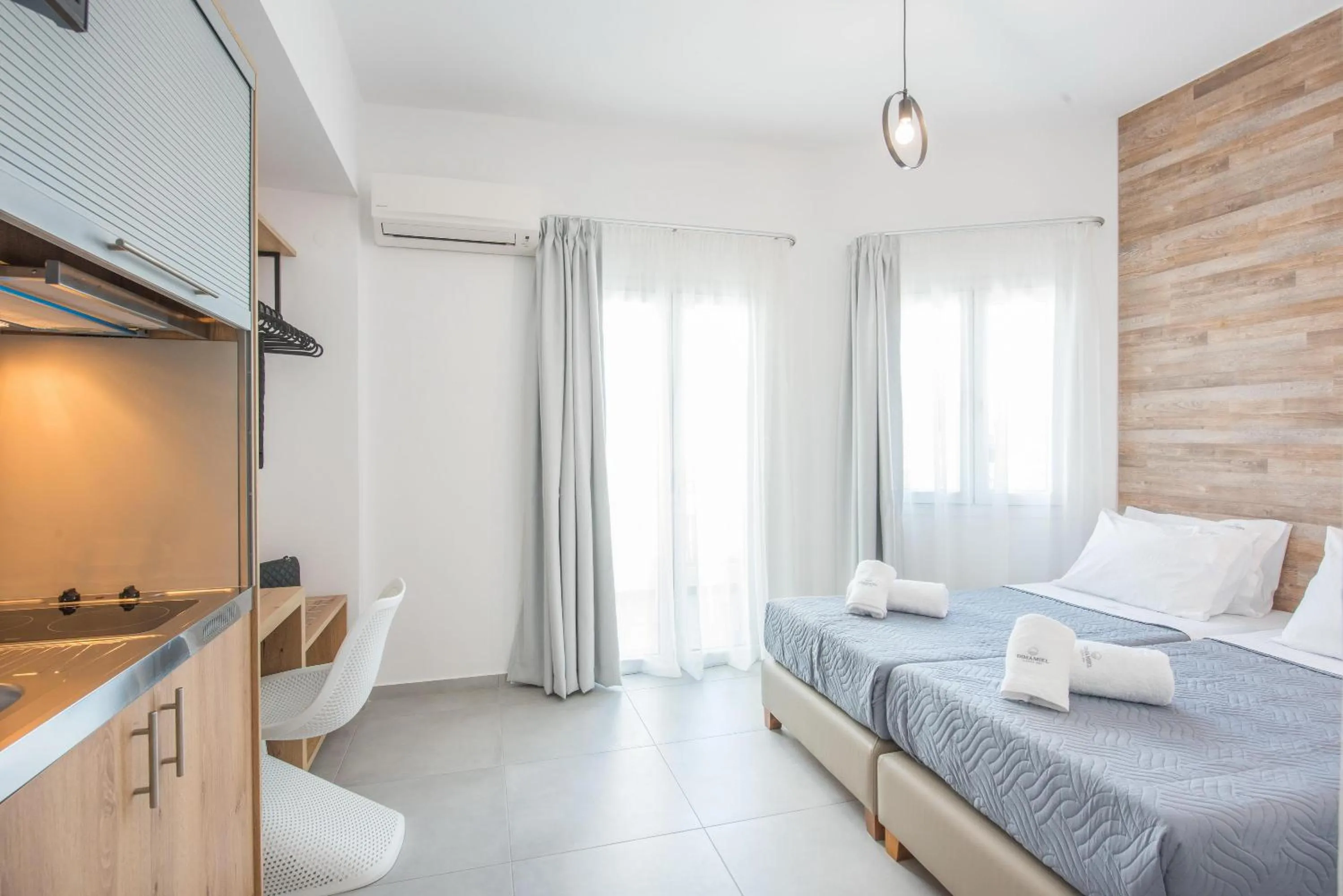 Photo of the whole room, Bed in Dimamiel Malia Inn