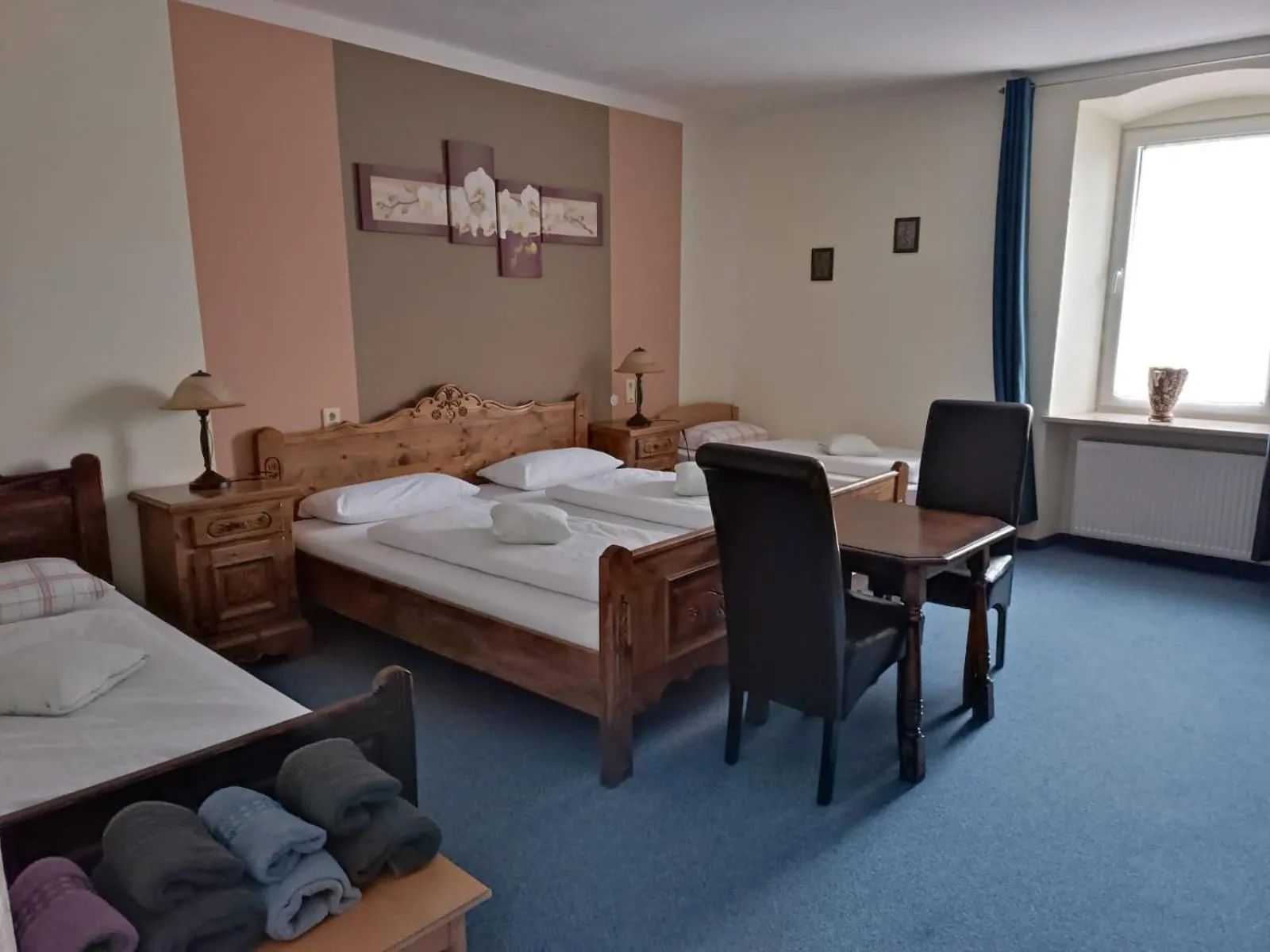 Bed in Garni Hotel Post