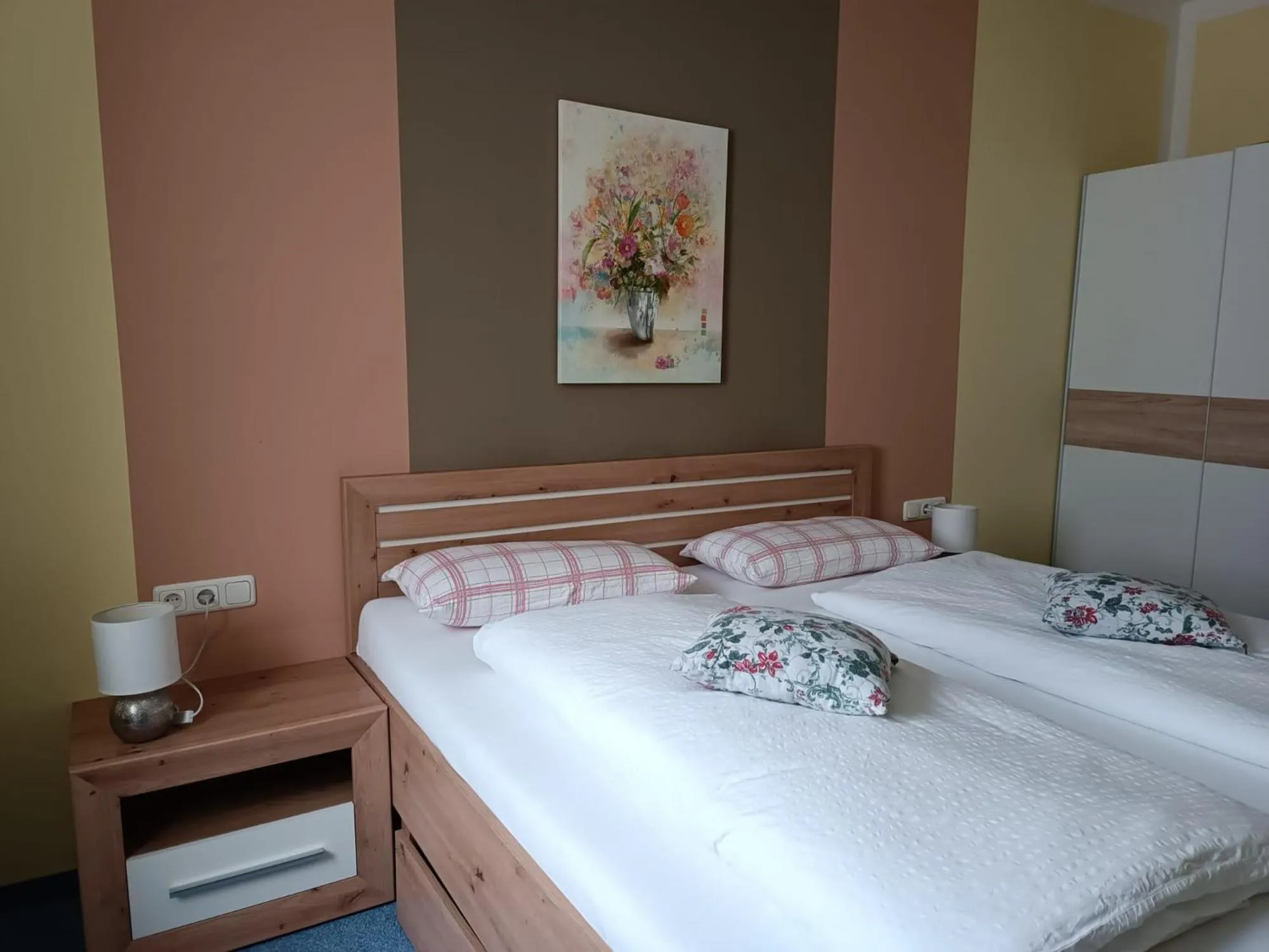 Bed in Garni Hotel Post