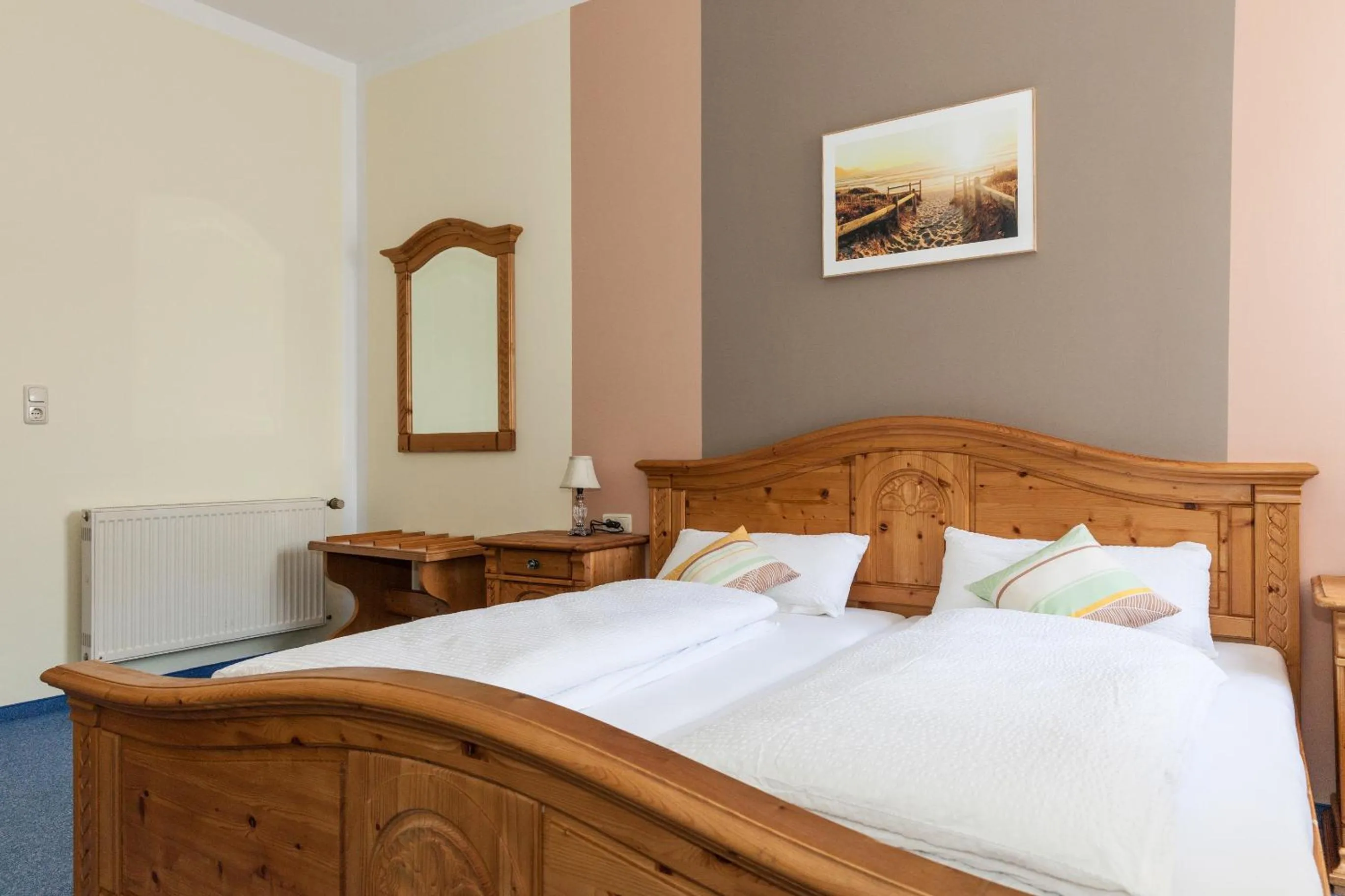 Bed in Garni Hotel Post