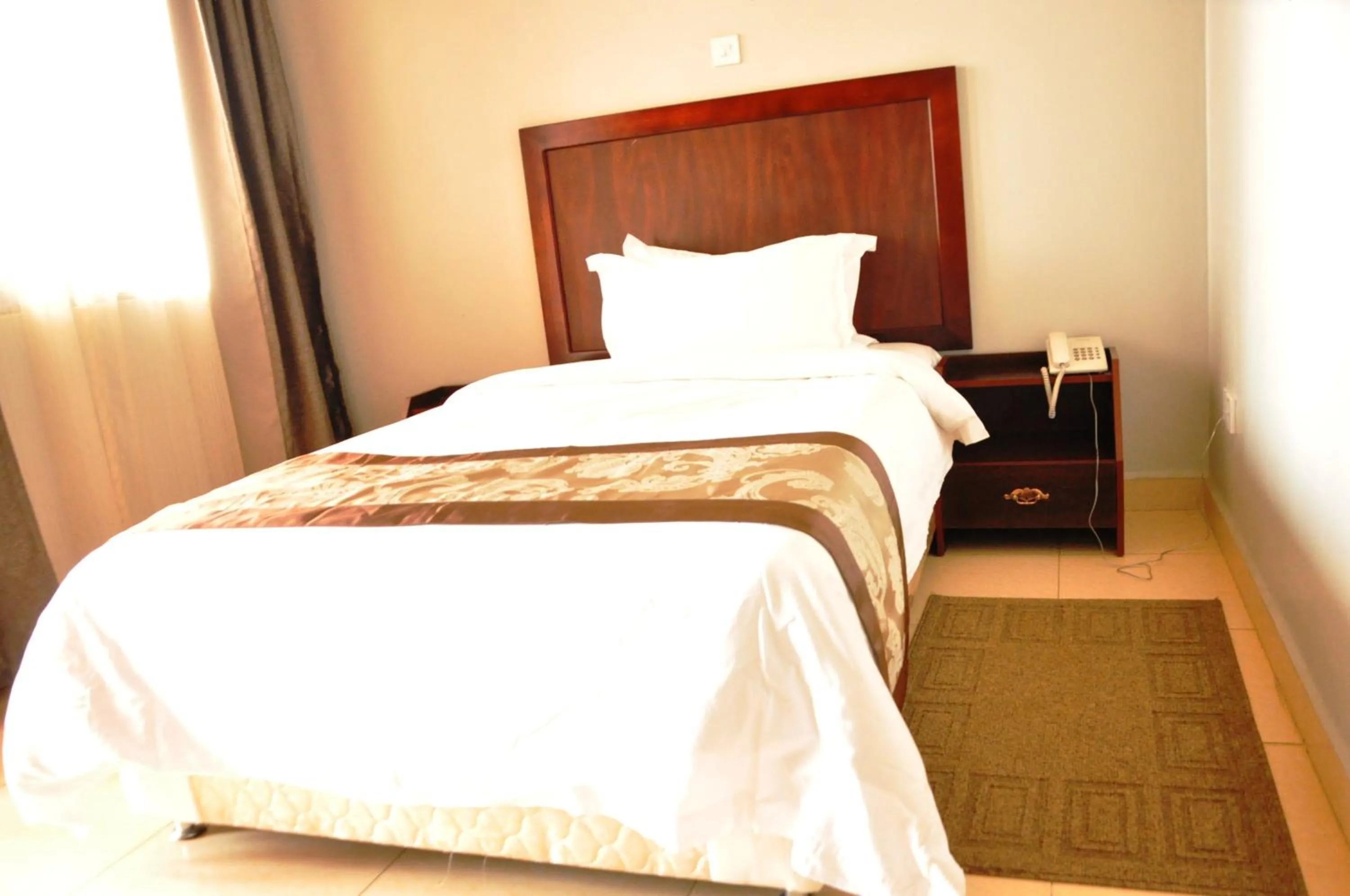 Bed in Easy View Hotel Mbarara