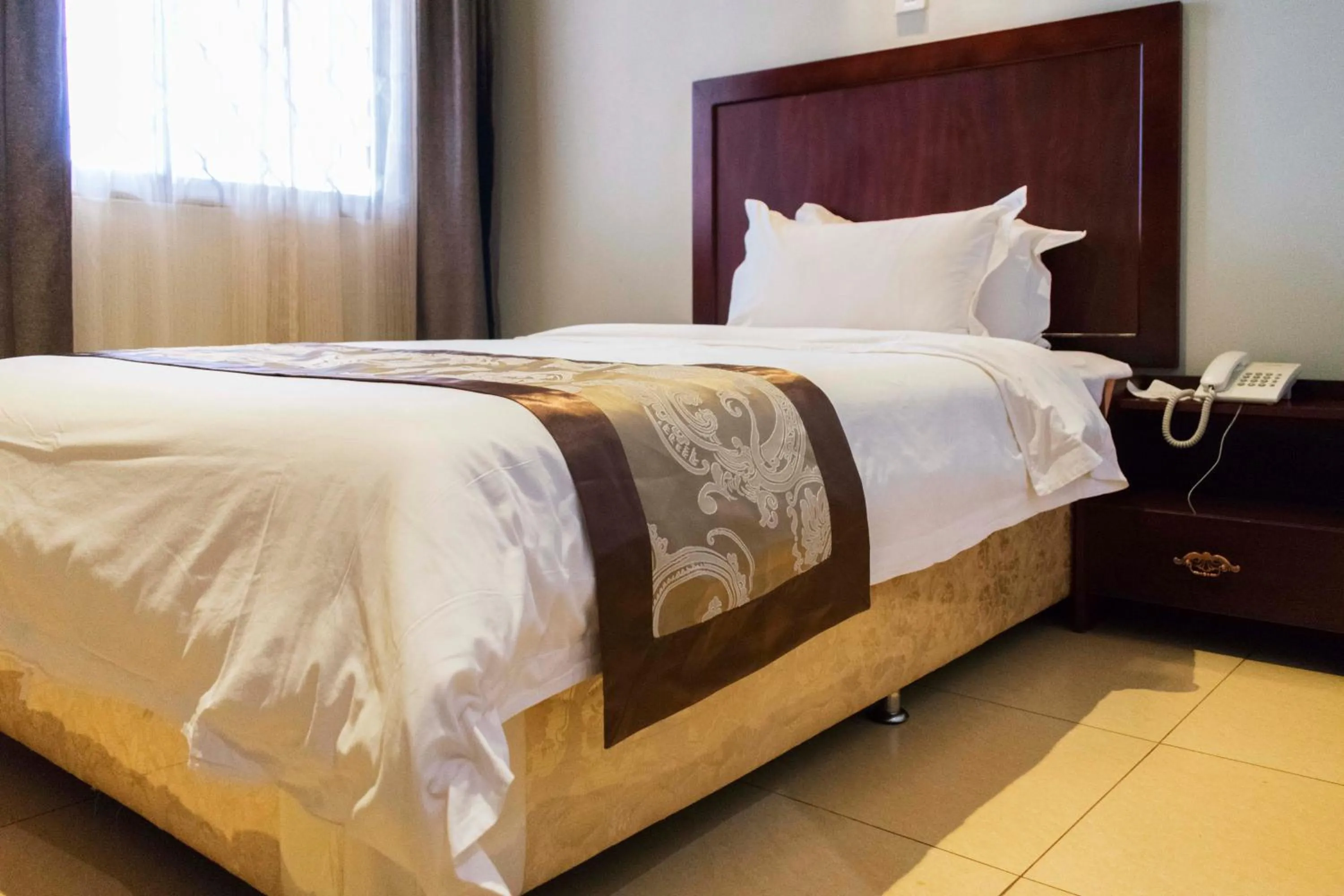 Bed in Easy View Hotel Mbarara