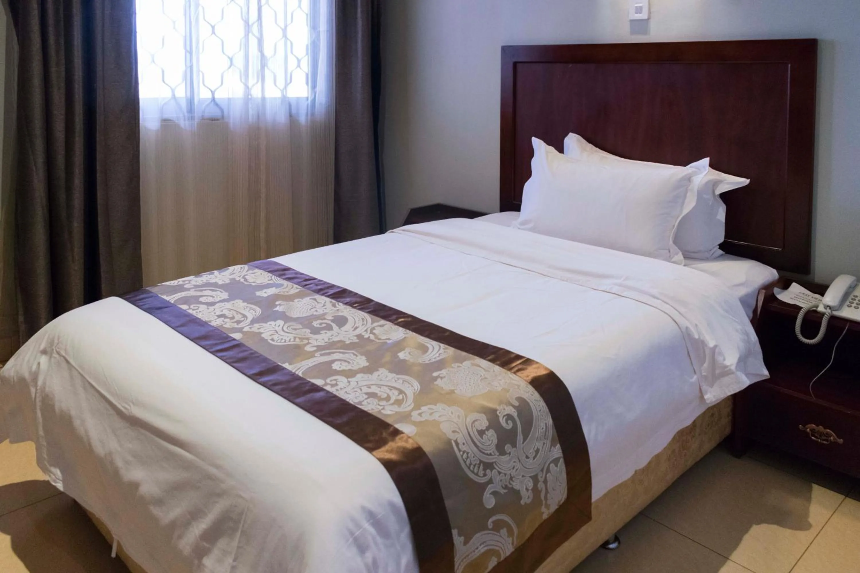 Bed in Easy View Hotel Mbarara
