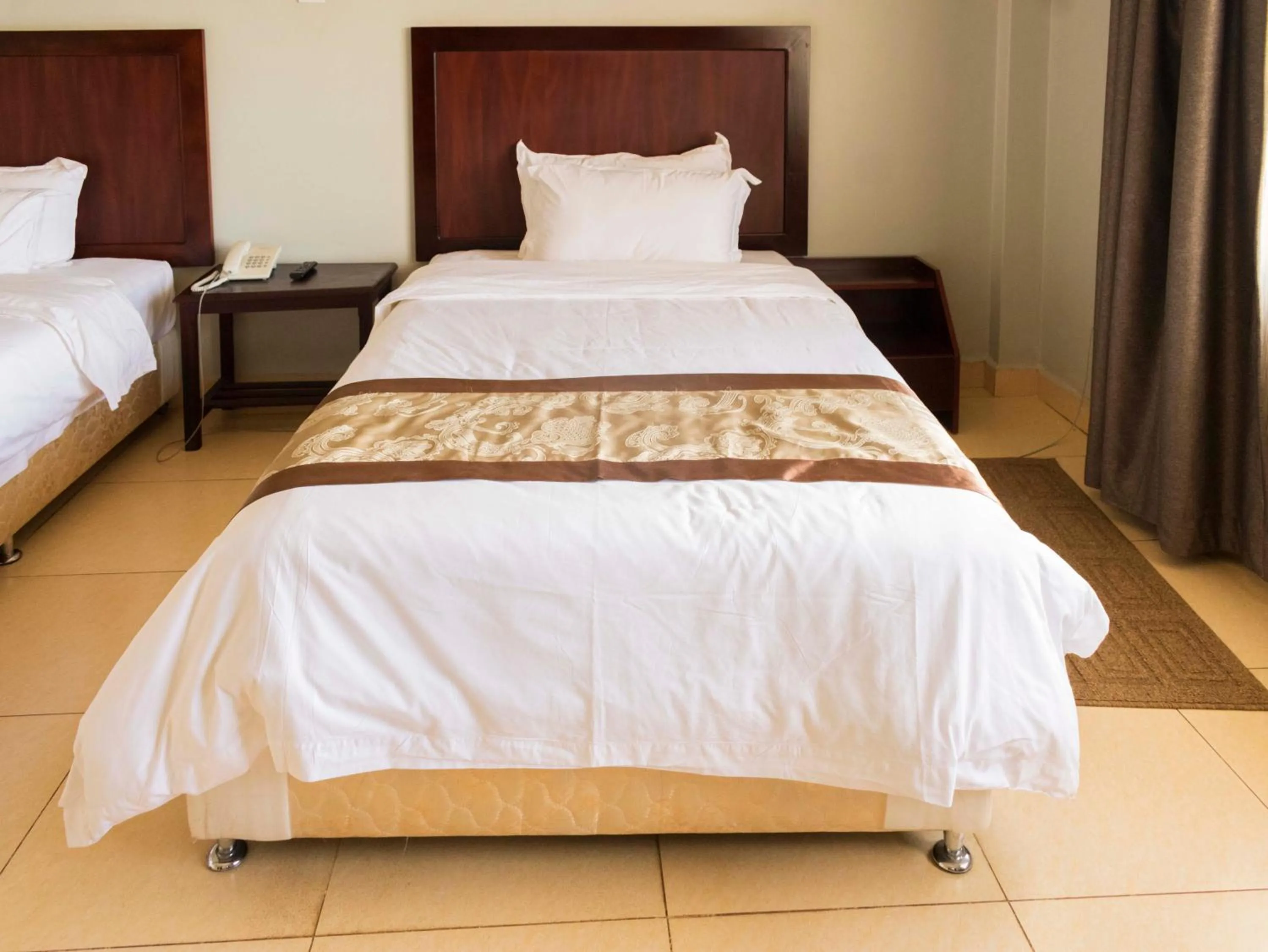 Bed in Easy View Hotel Mbarara