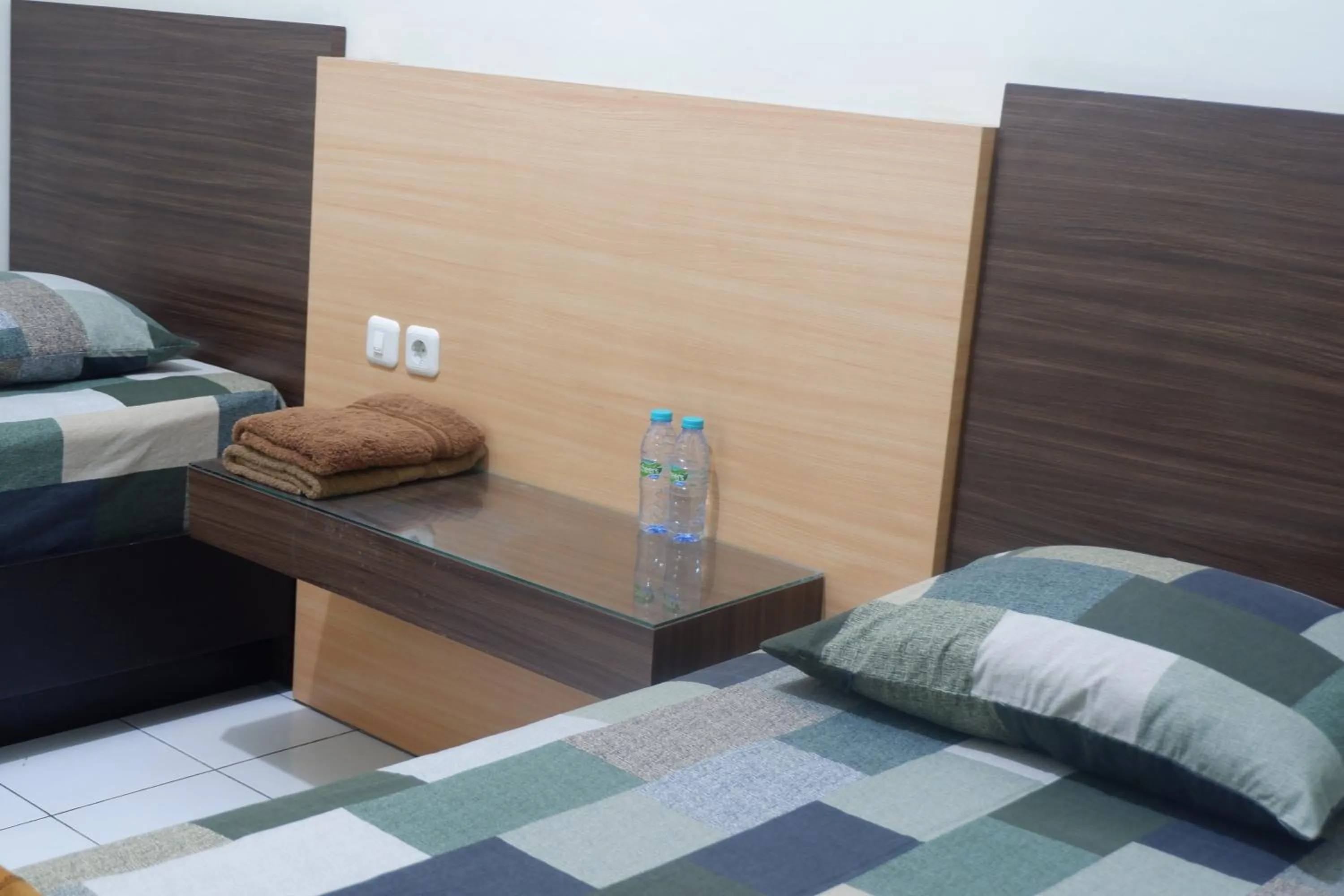 Bed in Hotel Taman Indah