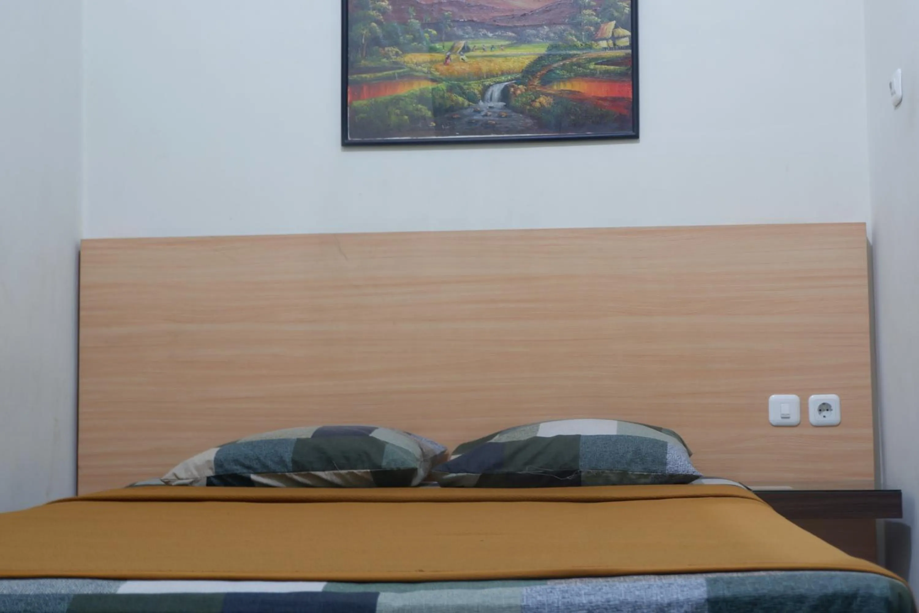 Bed in Hotel Taman Indah