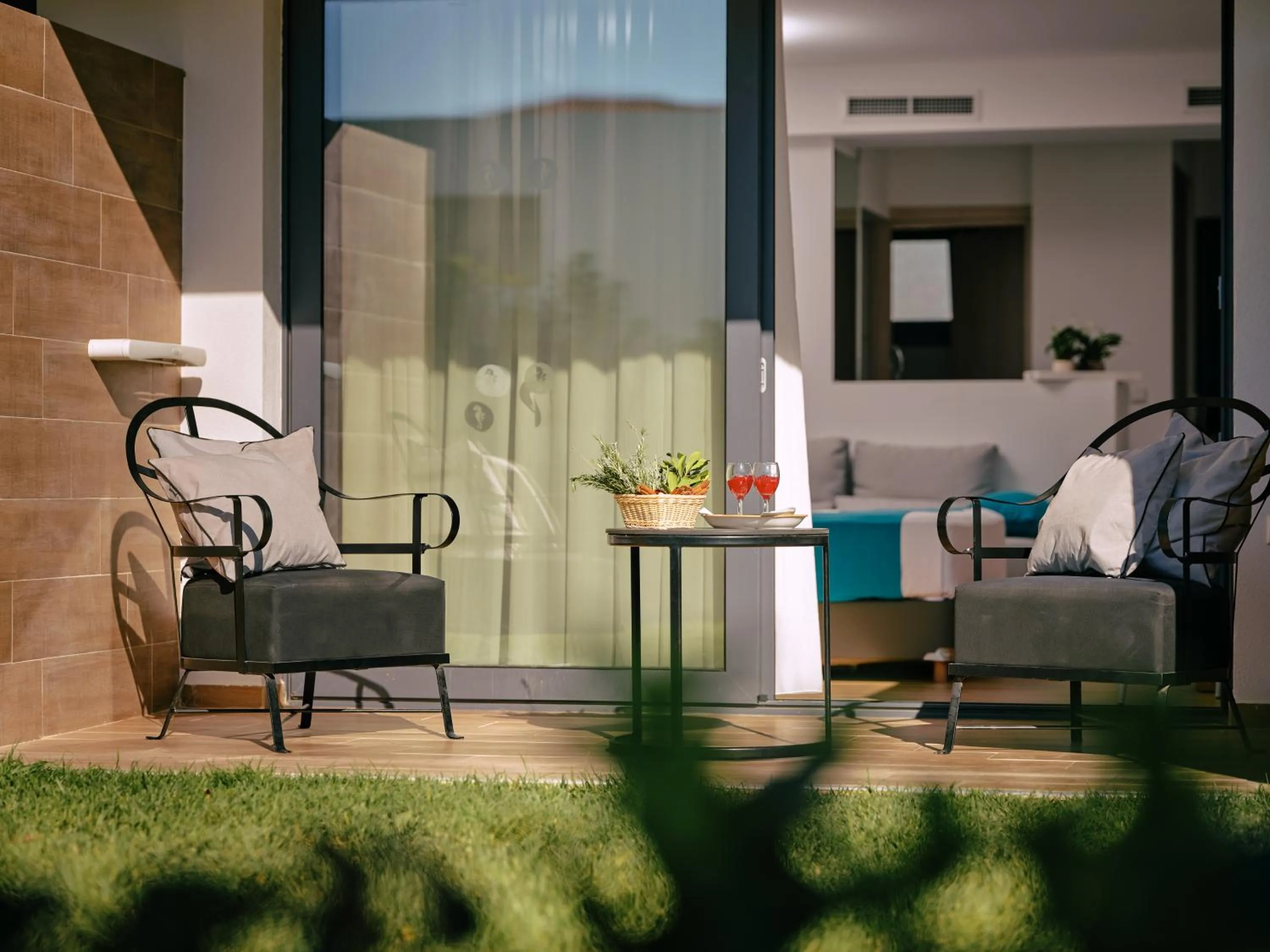 Patio in Cavo Orient Beach Hotel & Suites