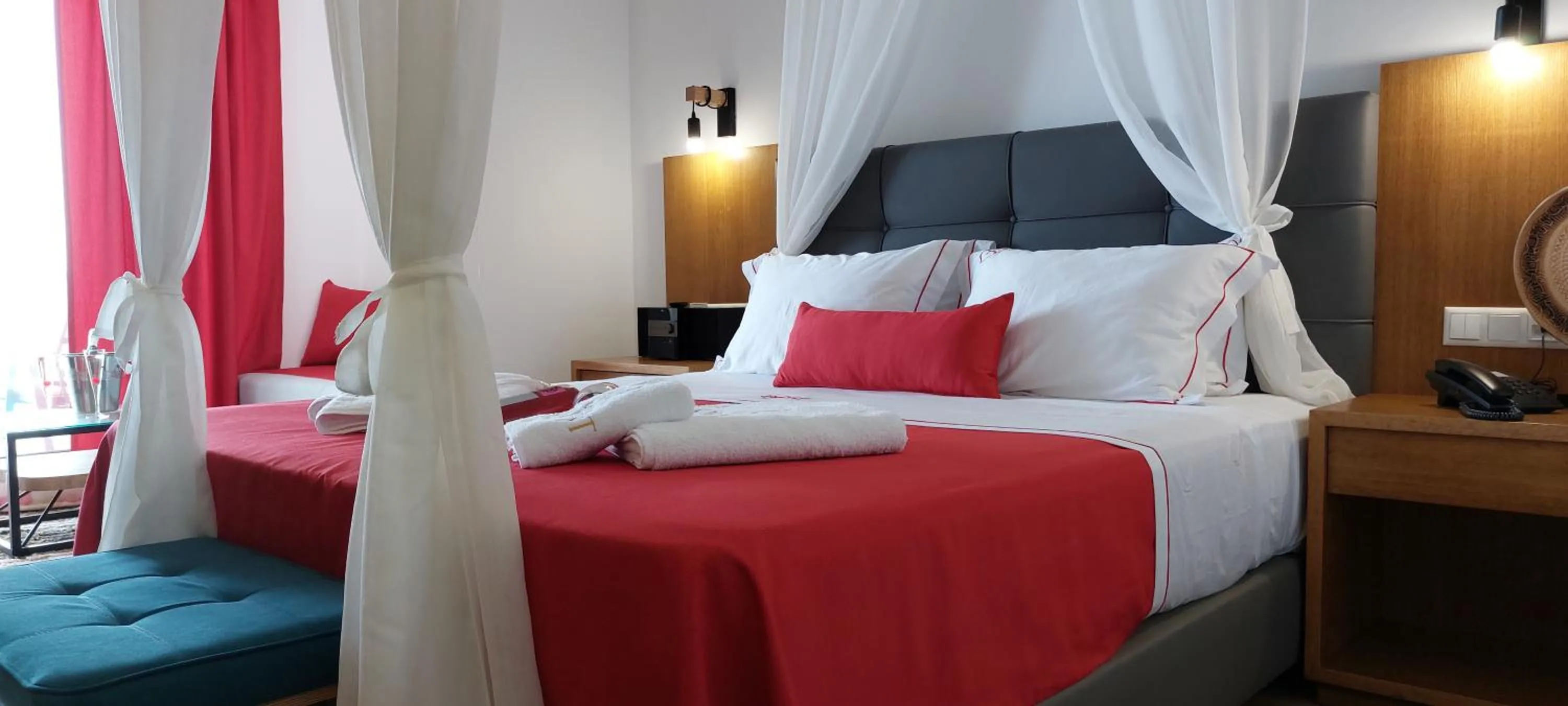 Bedroom, Bed in Cavo Orient Beach Hotel & Suites