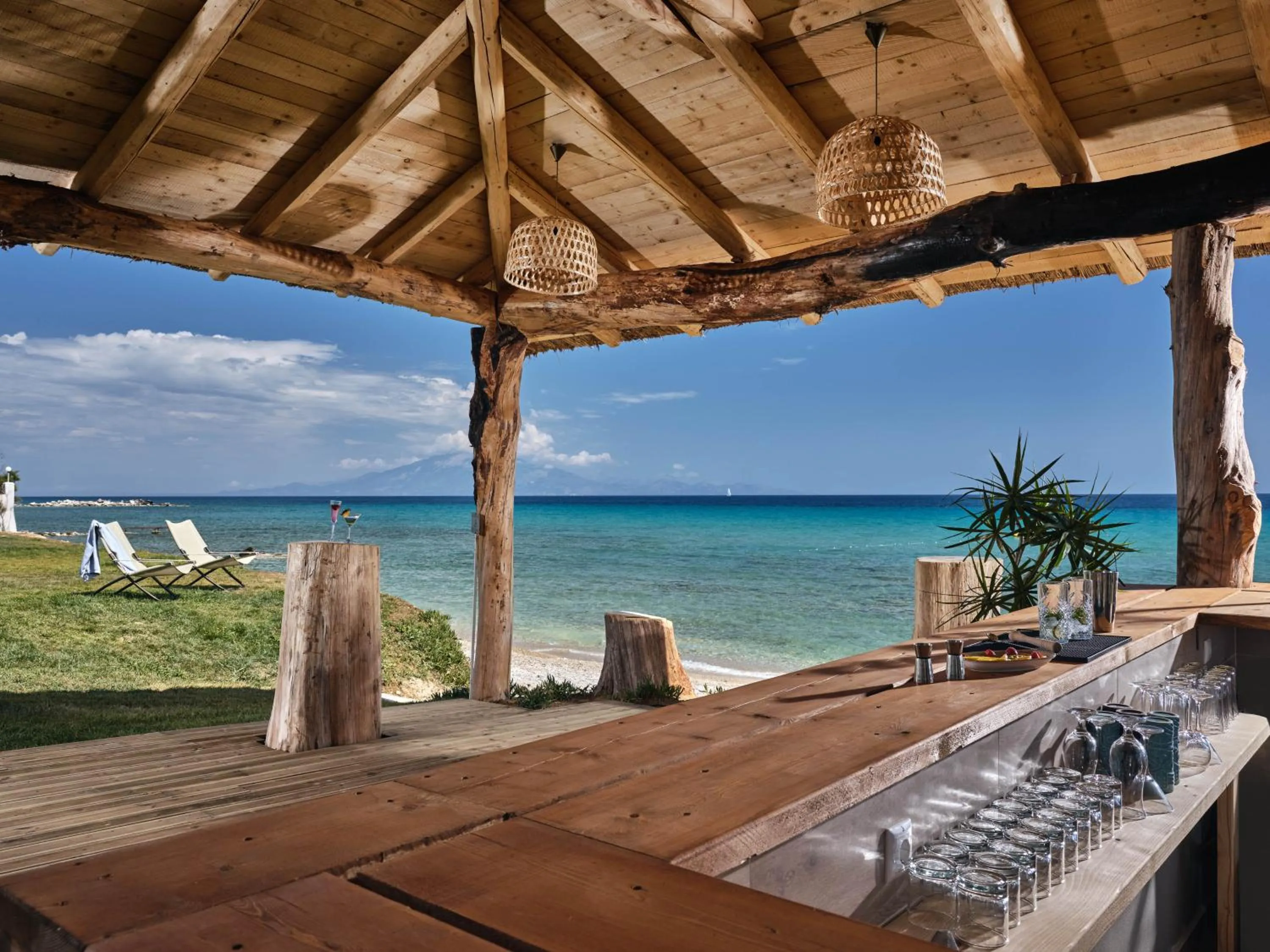 Lounge or bar in Cavo Orient Beach Hotel & Suites