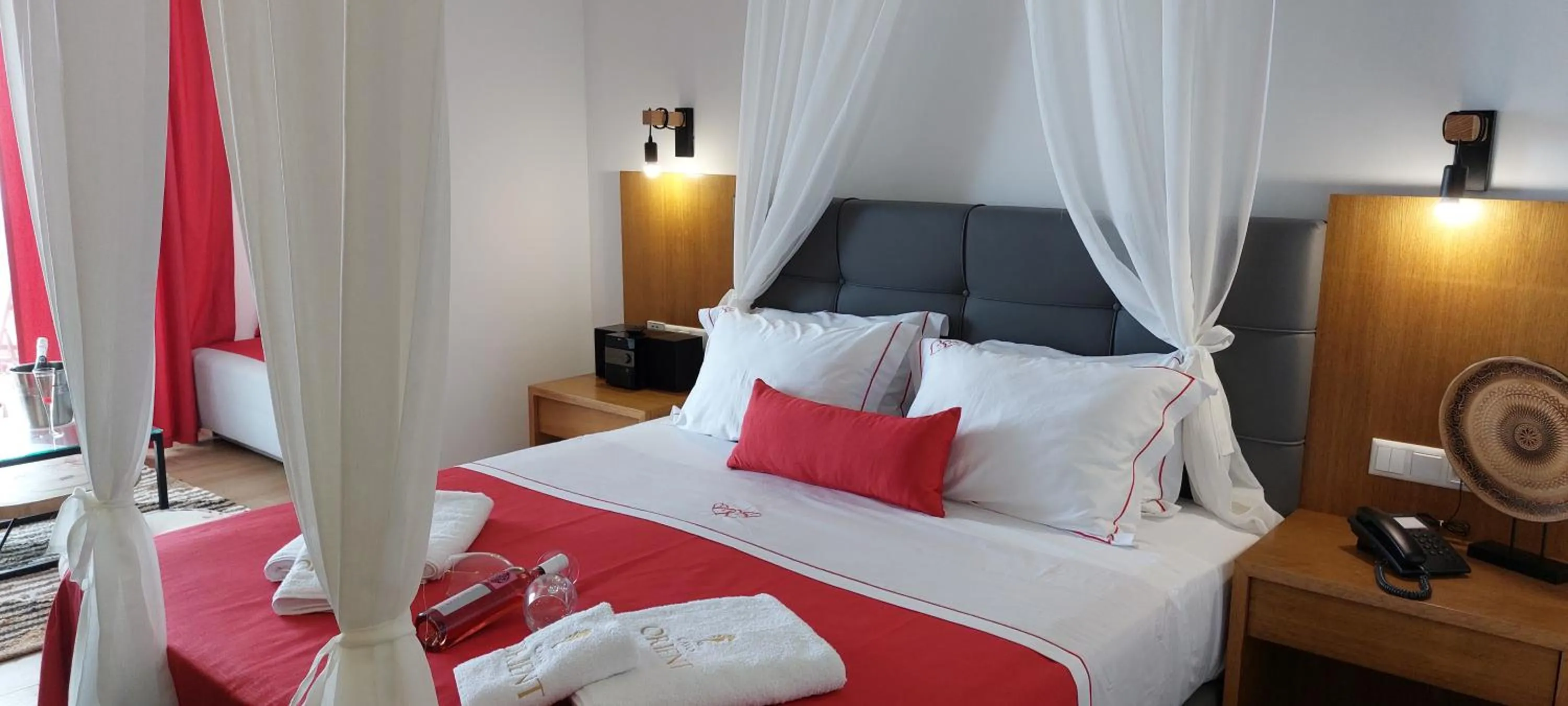 Bedroom, Bed in Cavo Orient Beach Hotel & Suites