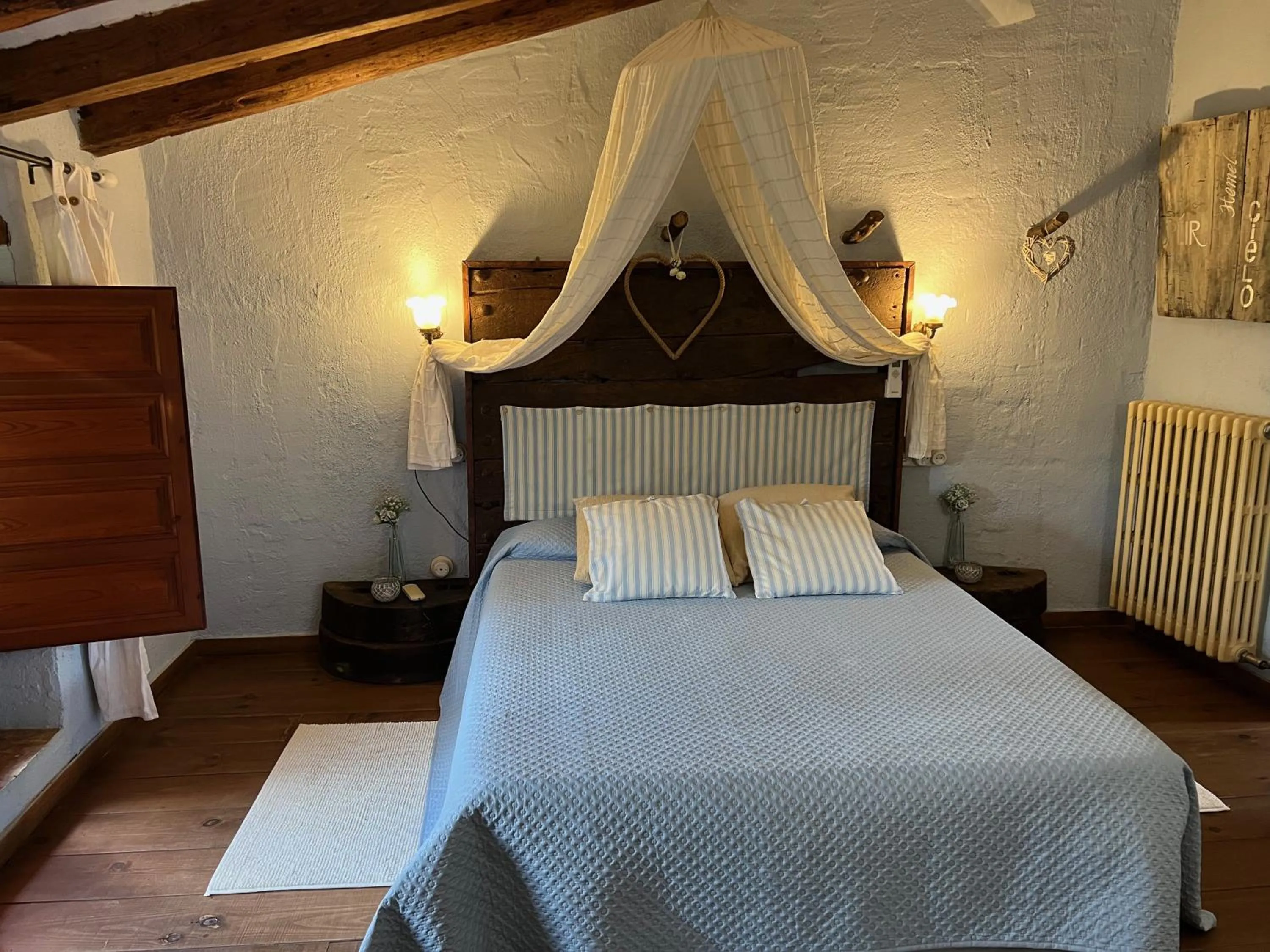 Bed in Les Vinyes Alojamiento Rural Boutique & SPA