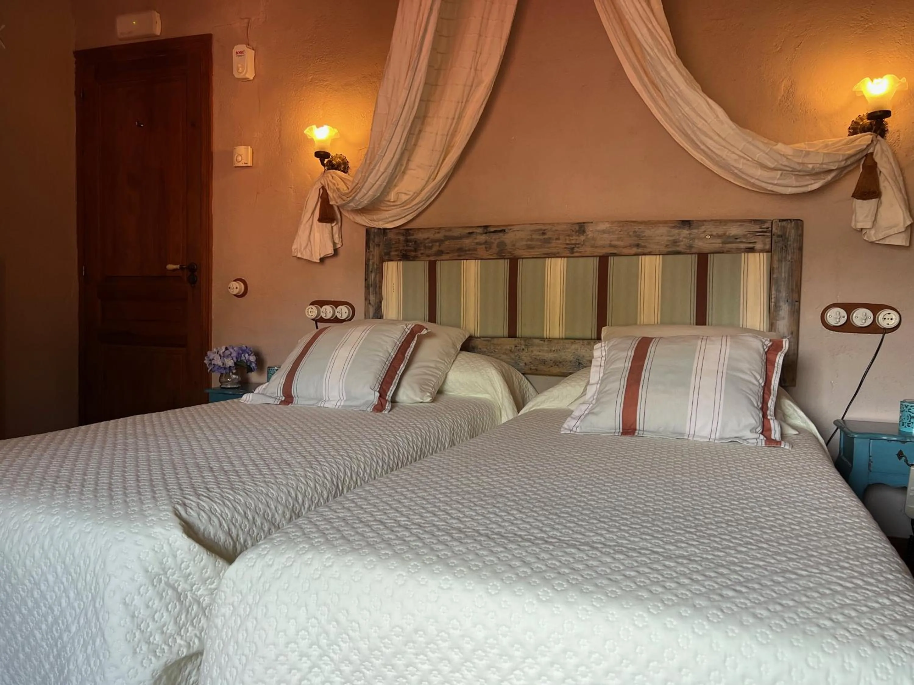 Bed in Les Vinyes Alojamiento Rural Boutique & SPA