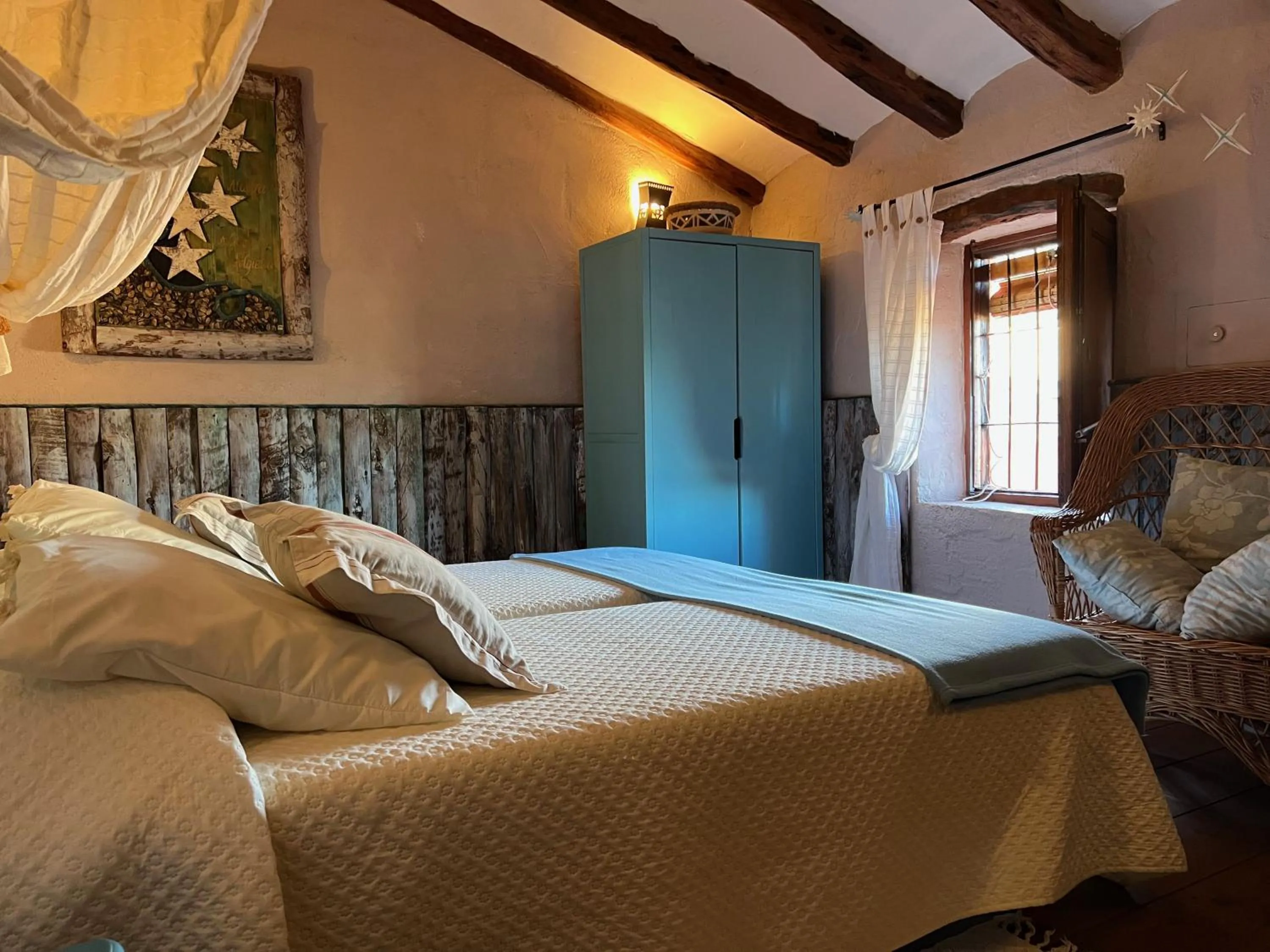 Bed in Les Vinyes Alojamiento Rural Boutique & SPA