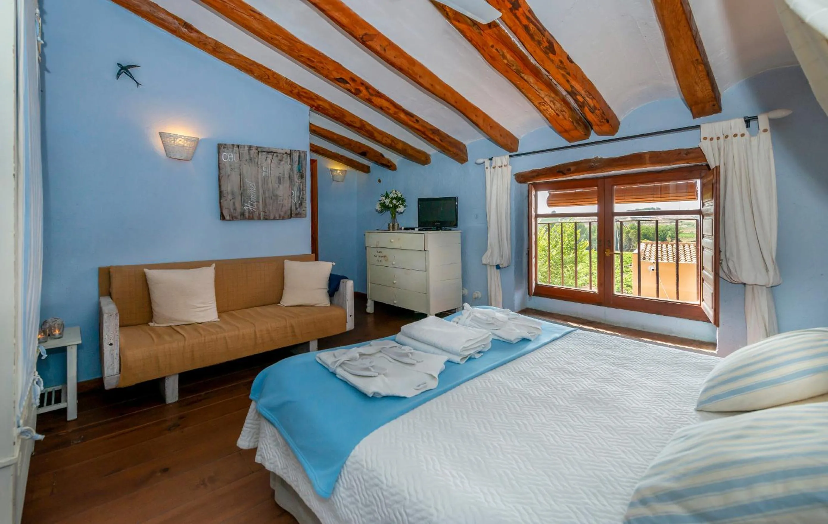 Bed in Les Vinyes Alojamiento Rural Boutique & SPA