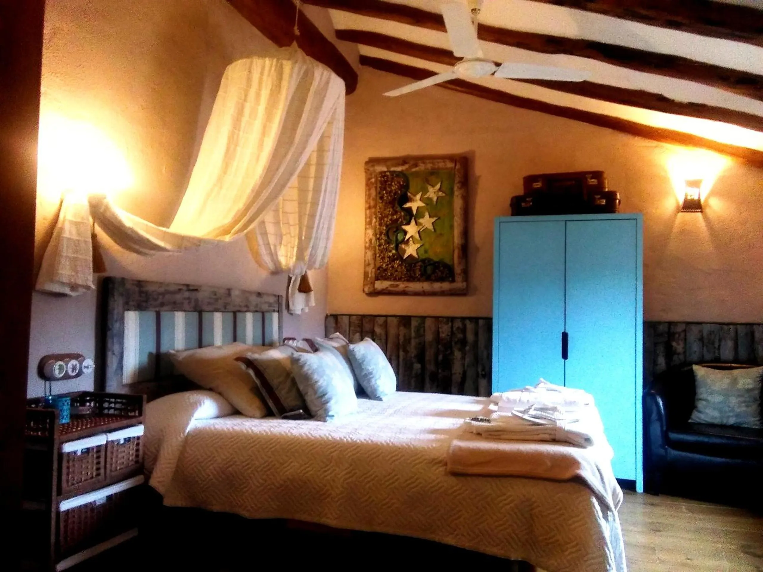 Bed in Les Vinyes Alojamiento Rural Boutique & SPA