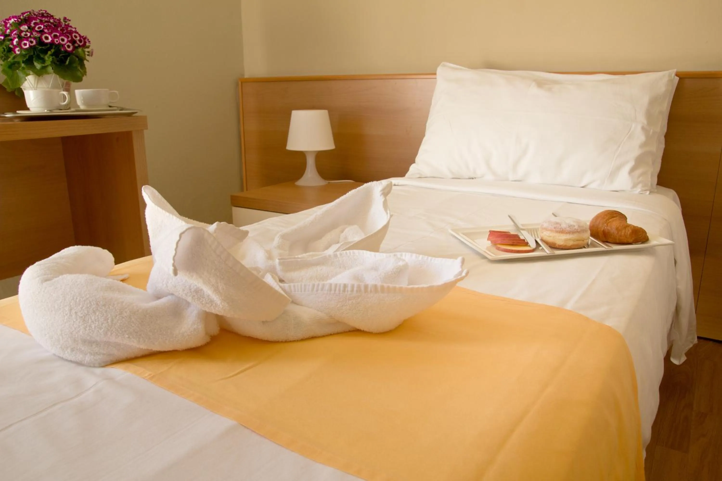 Bed in Hotel La Fenice