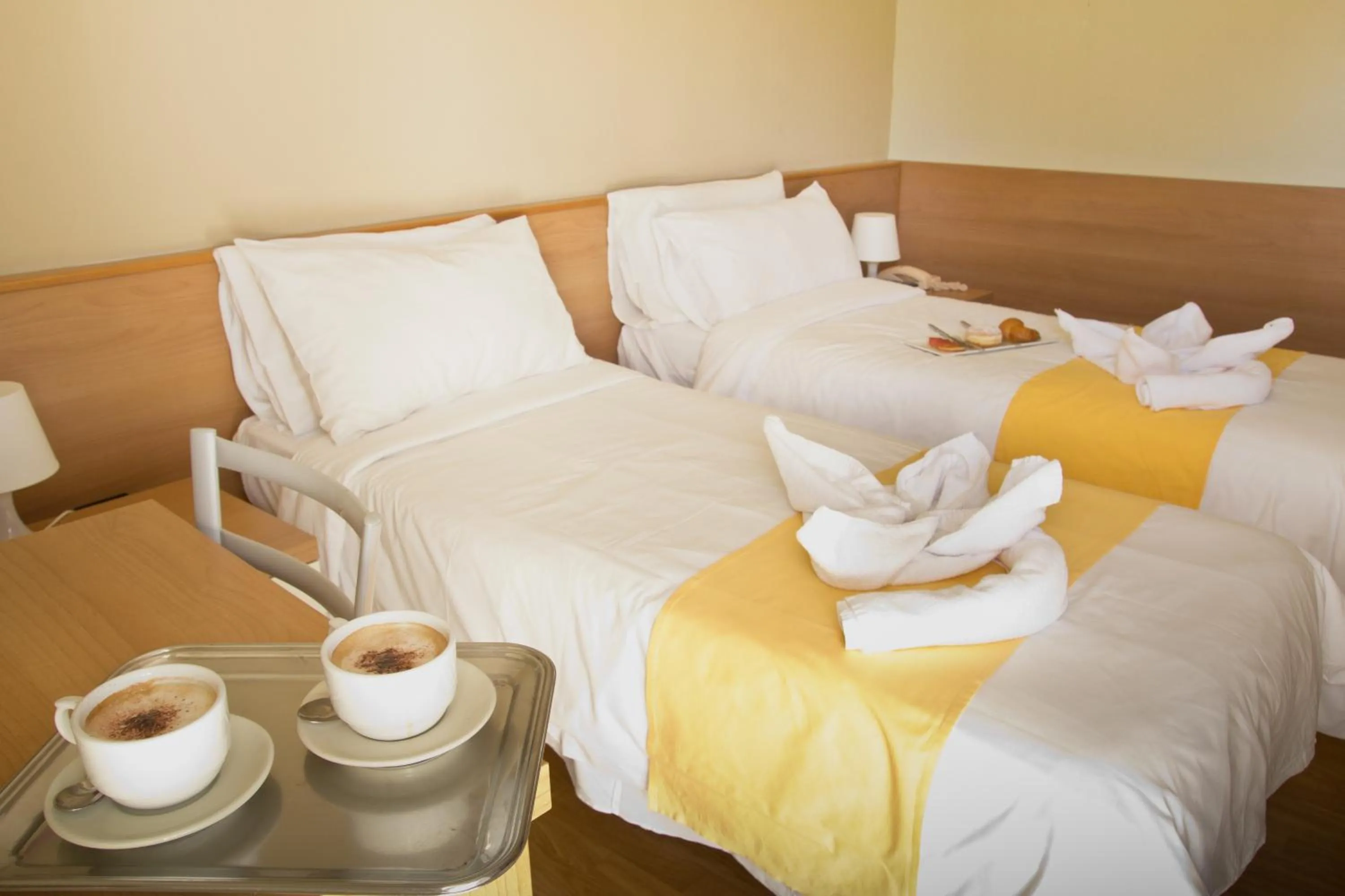 Bed in Hotel La Fenice