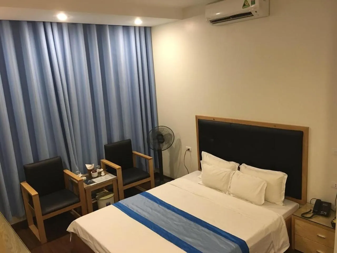 Living room, Bed in Hotel Royal