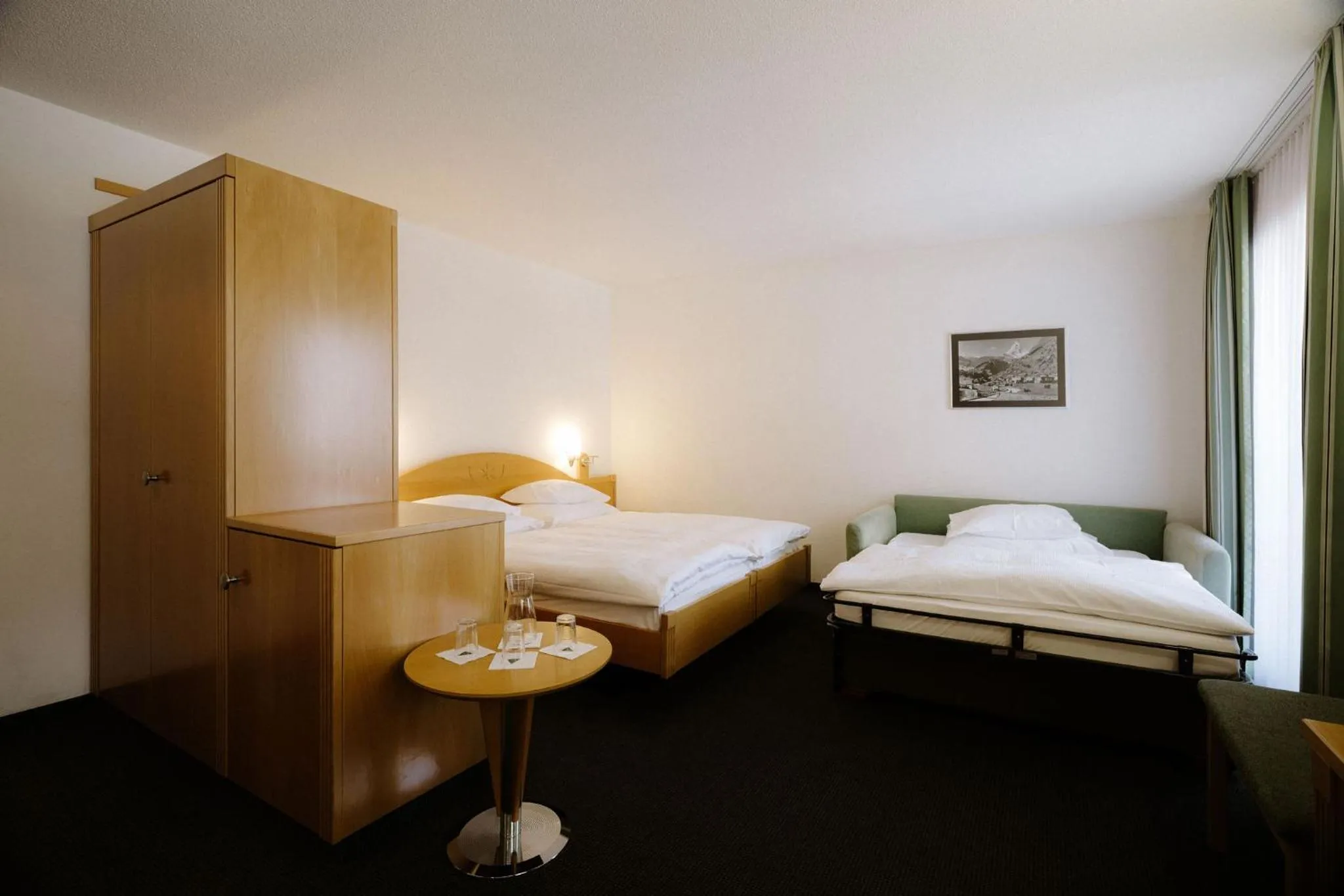 Triple Room in Alpine Hotel Perren