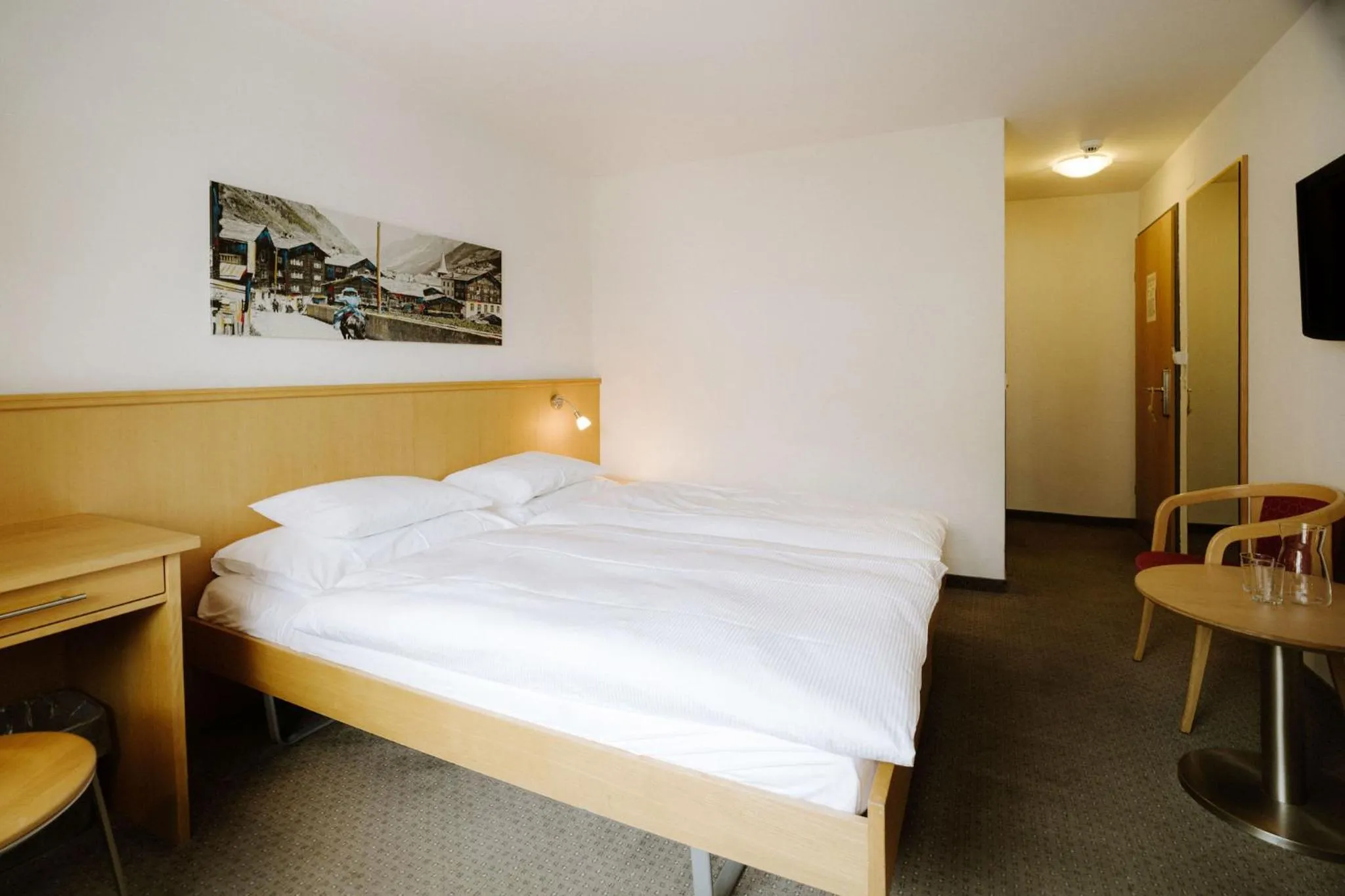 Bed in Alpine Hotel Perren