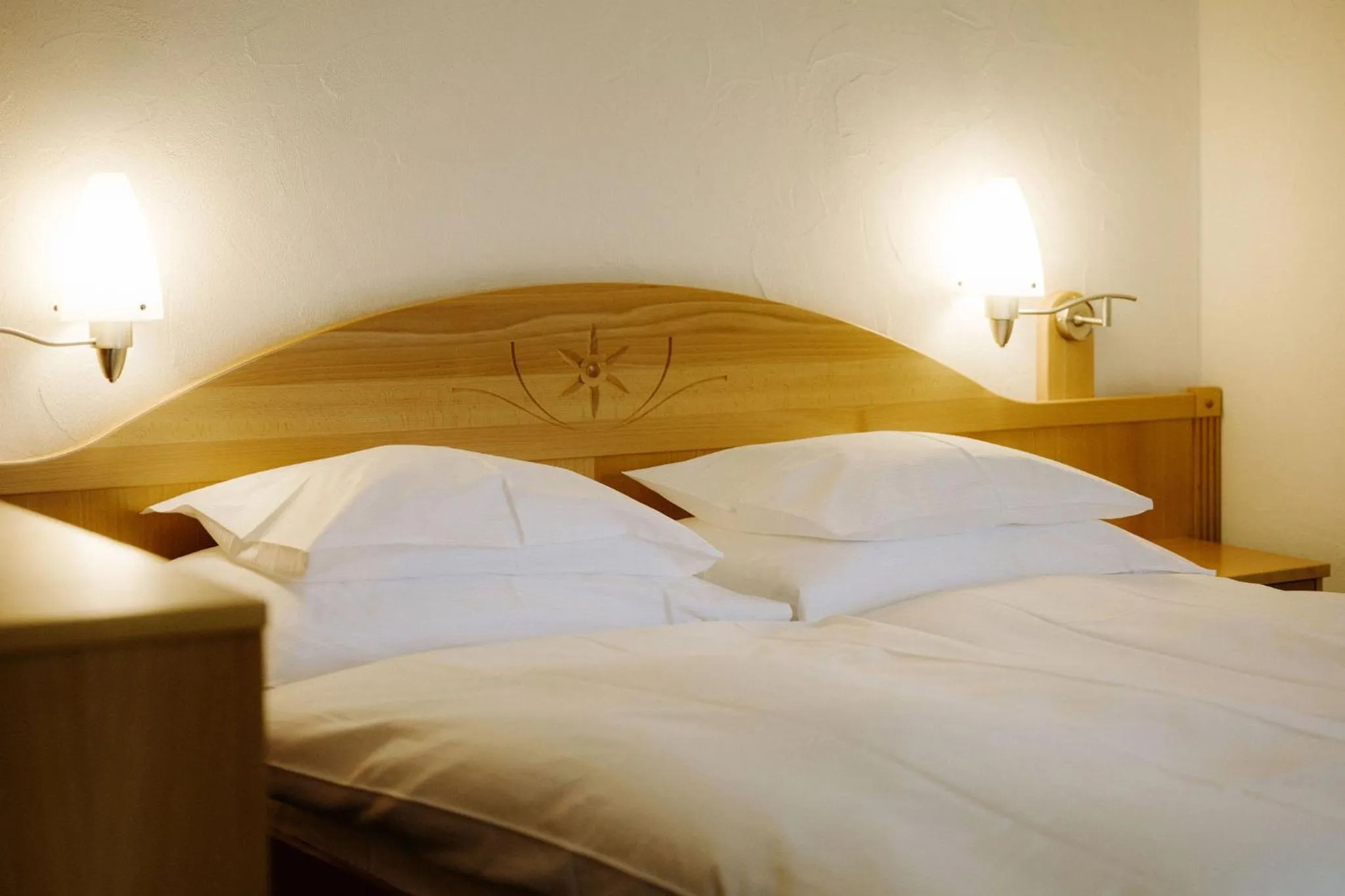 Bed in Alpine Hotel Perren