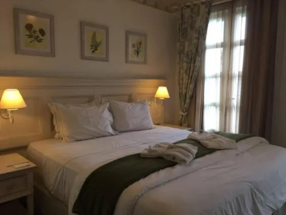 Bed in Il Campanario Villagio Resort Apto Studio 2111