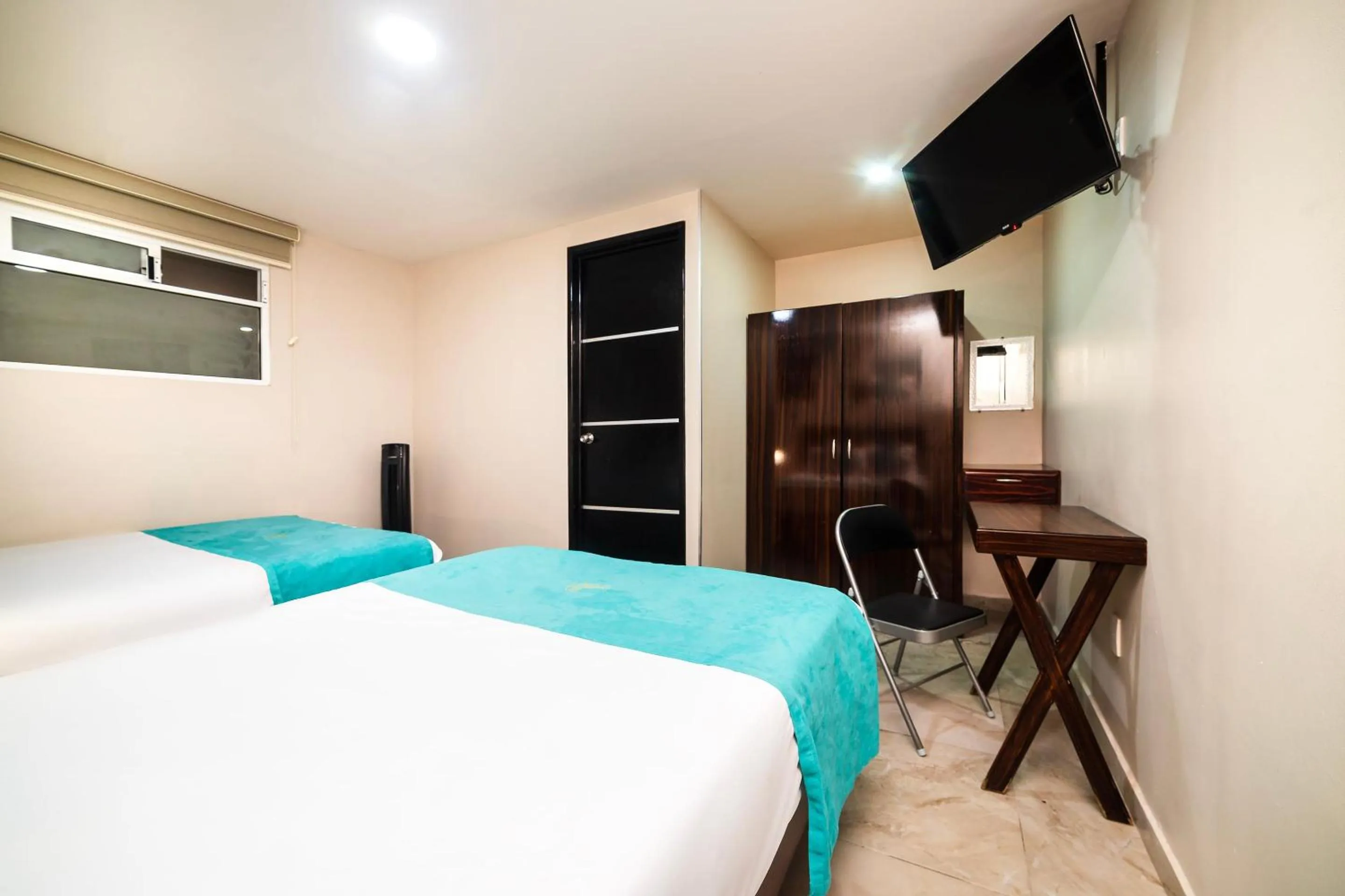 Bedroom in OYO Hotel Boutique Las Campanas