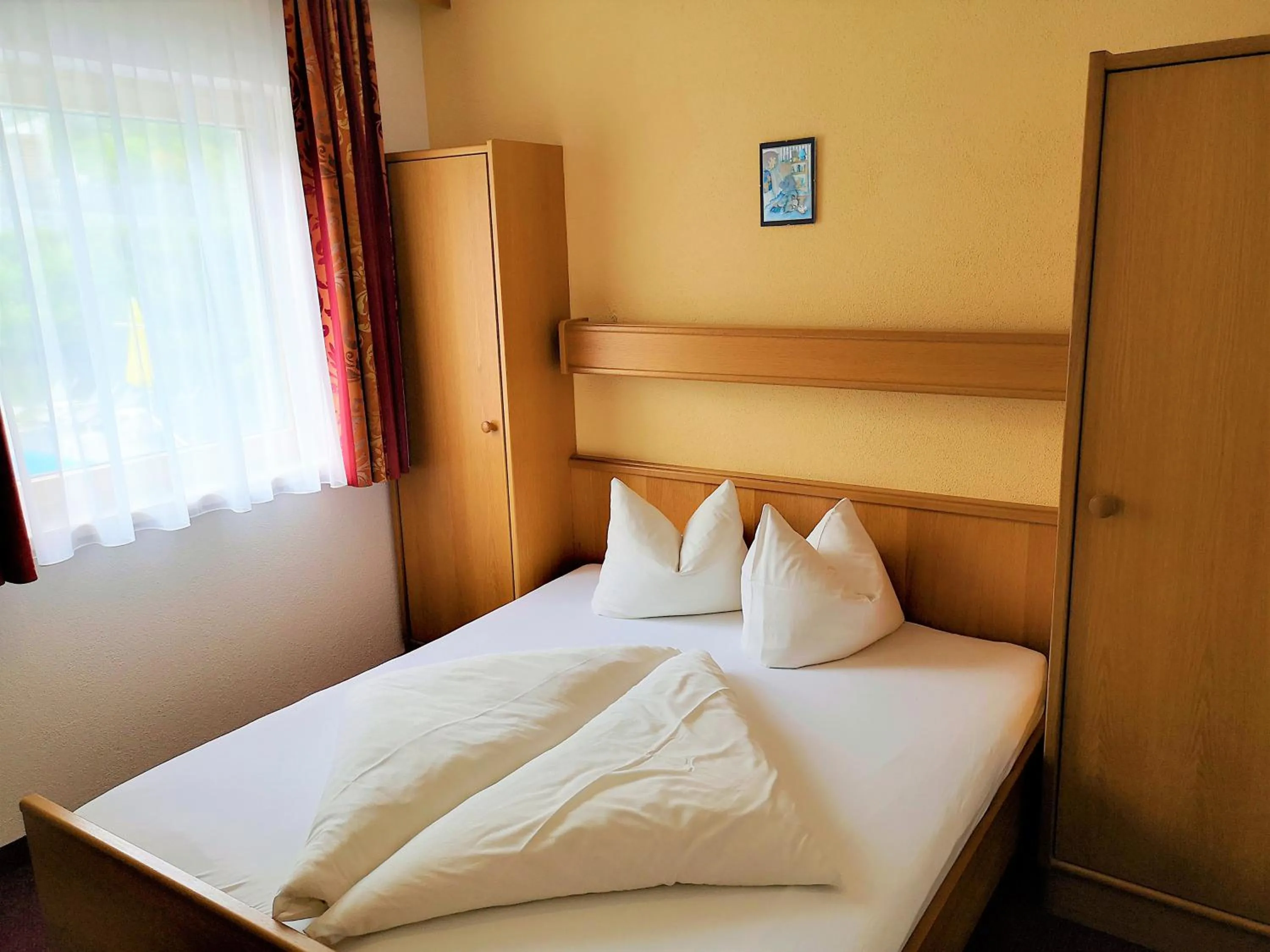 Bed in Apart Hotel Ideal