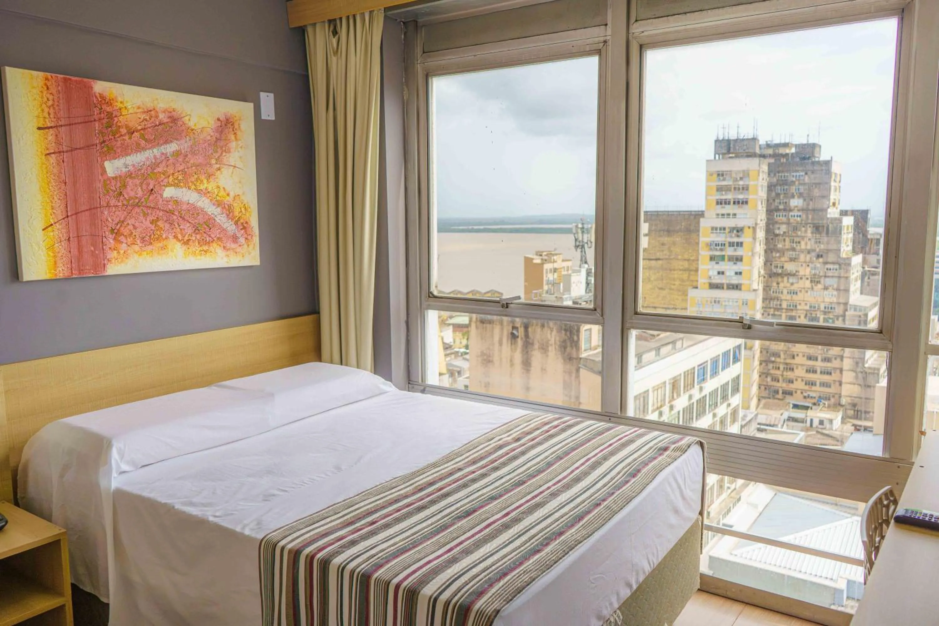 Photo of the whole room, Bed in Hotel Dan Inn Express Porto Alegre by Nacional Inn -Próximo à Arena do Grêmio, Parque Harmonia e Réveillon na Orla do Guaíba