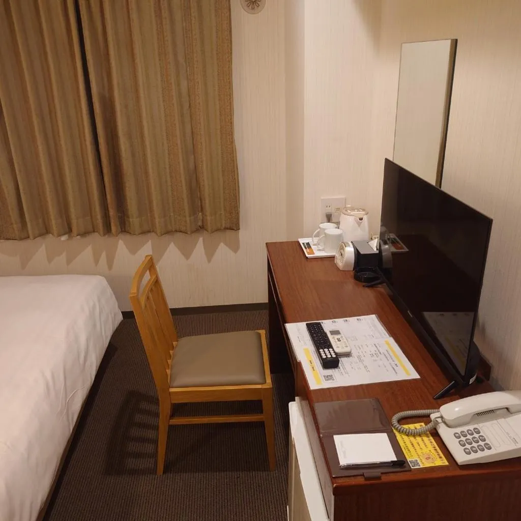 Bed in Smile Hotel Namba