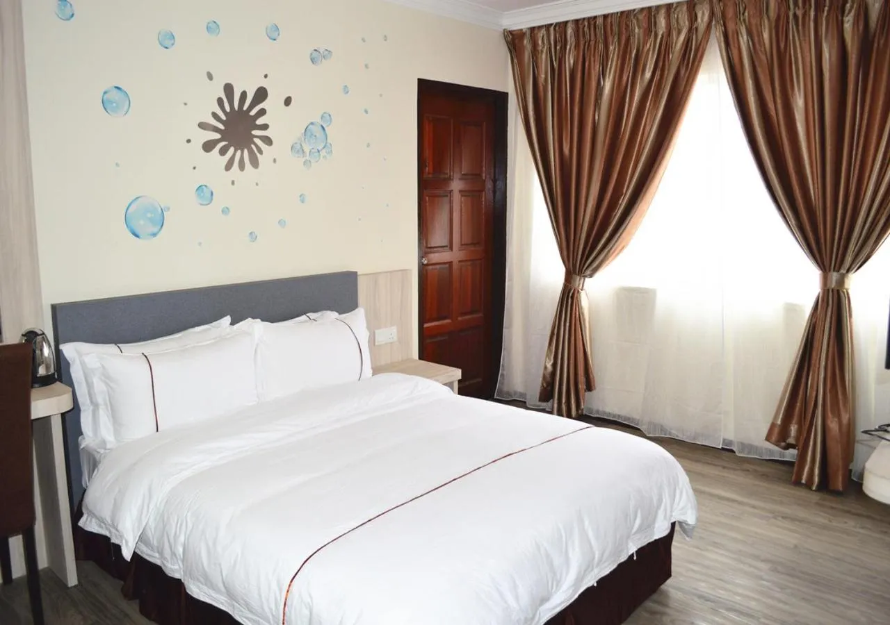 Bed in Angsoka Hotel