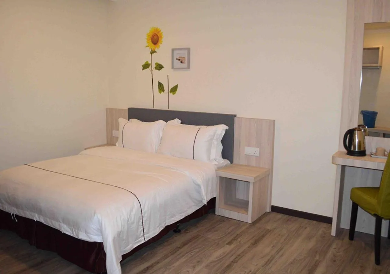 Bed in Angsoka Hotel