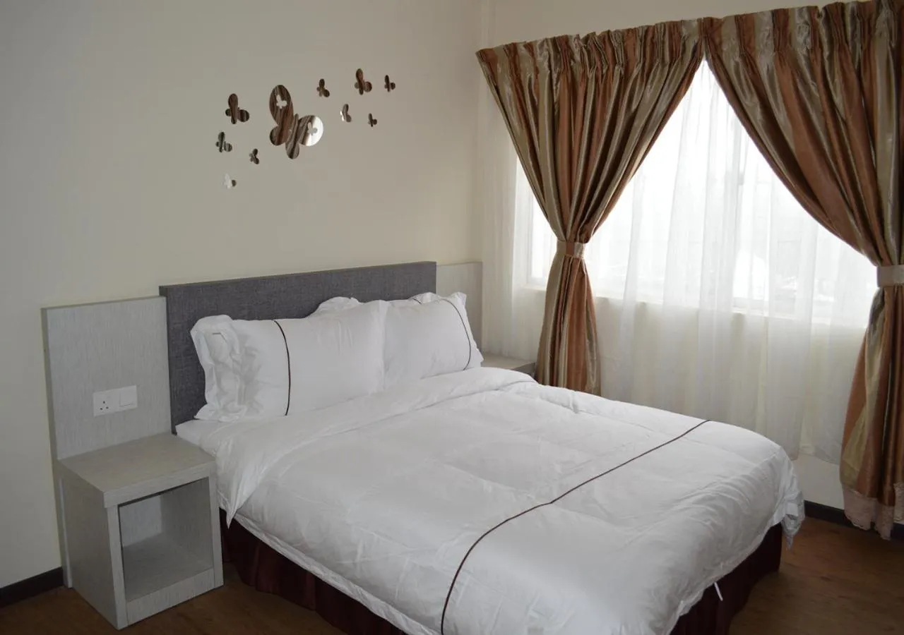 Bed in Angsoka Hotel