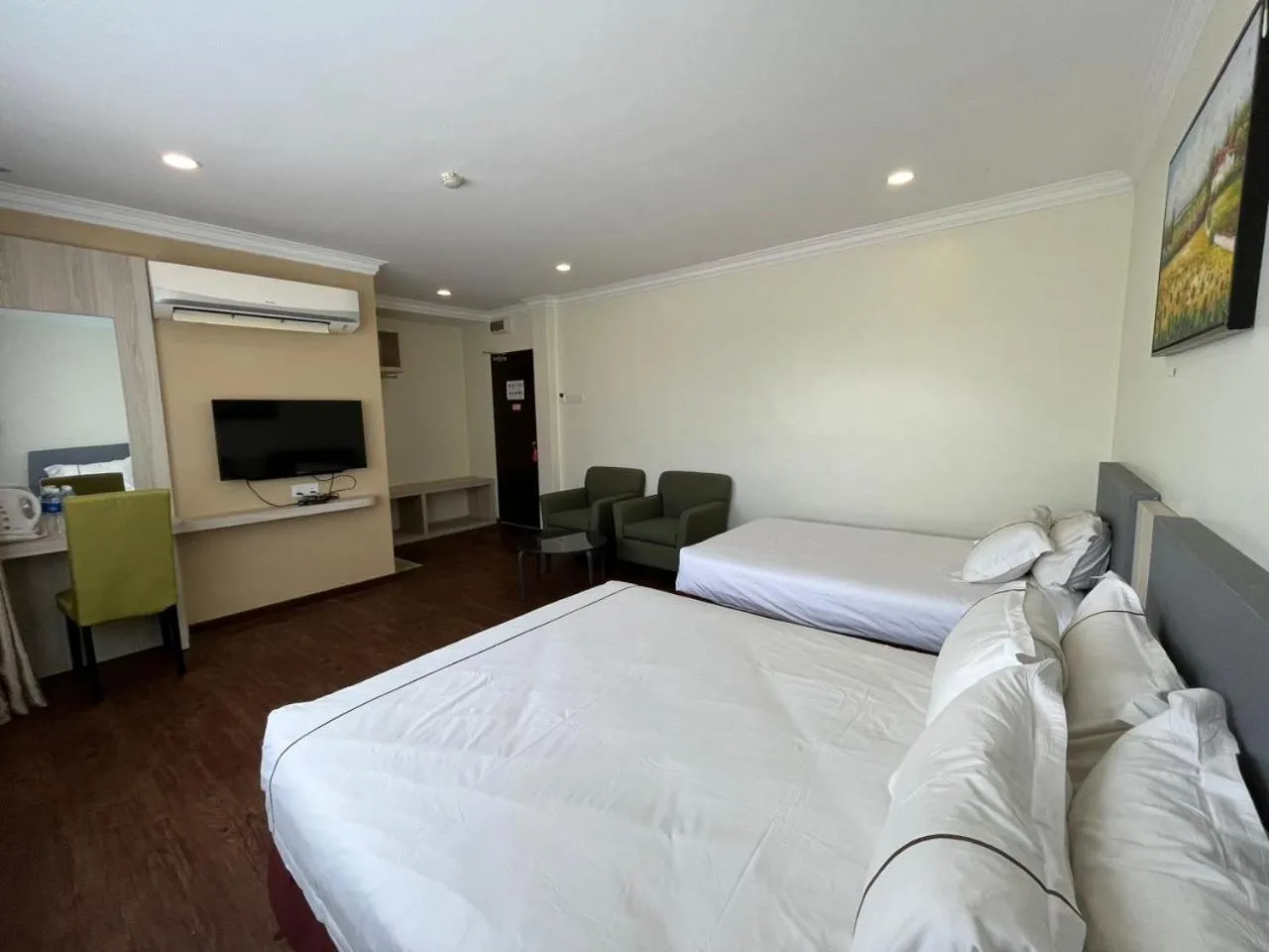 Seating area, Bed in Angsoka Hotel