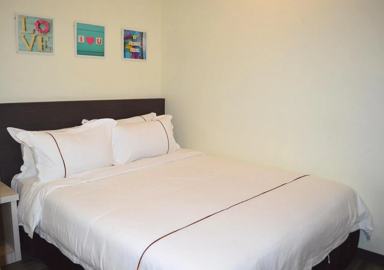 Bed in Angsoka Hotel