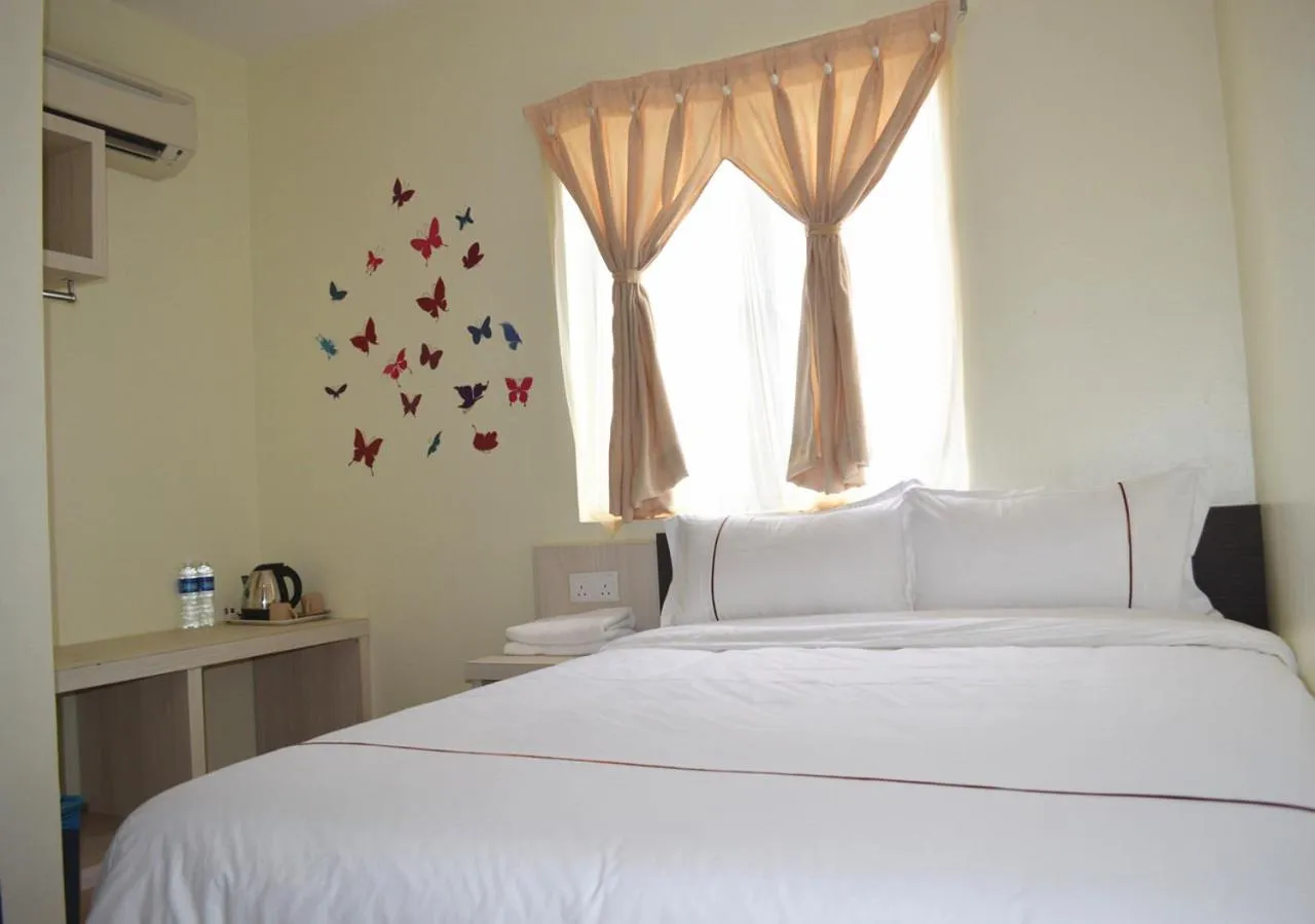 Bed in Angsoka Hotel