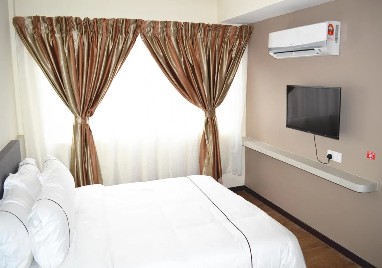 Bed in Angsoka Hotel
