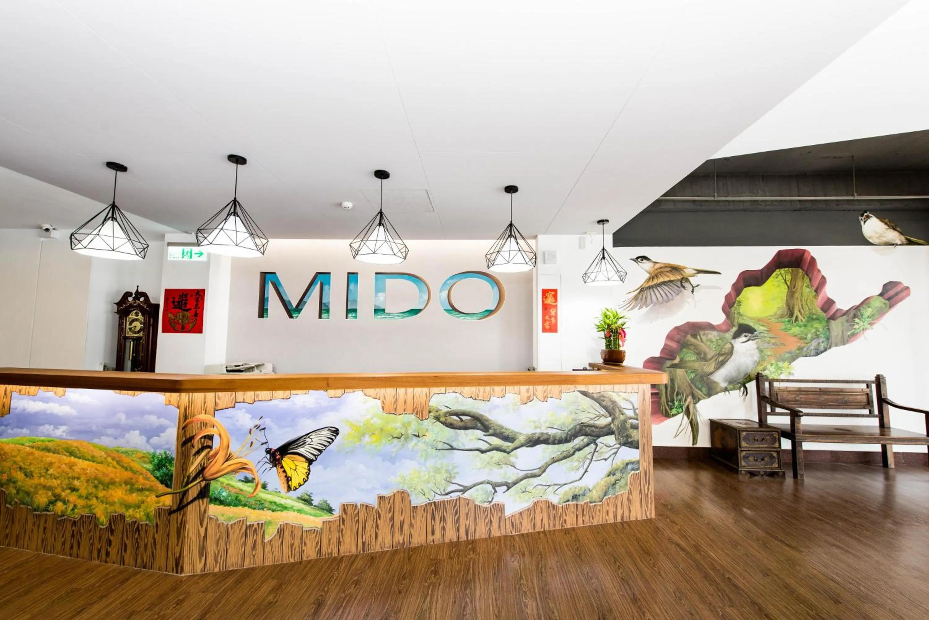 Property logo or sign in Traveller Inn - Mido Hotel