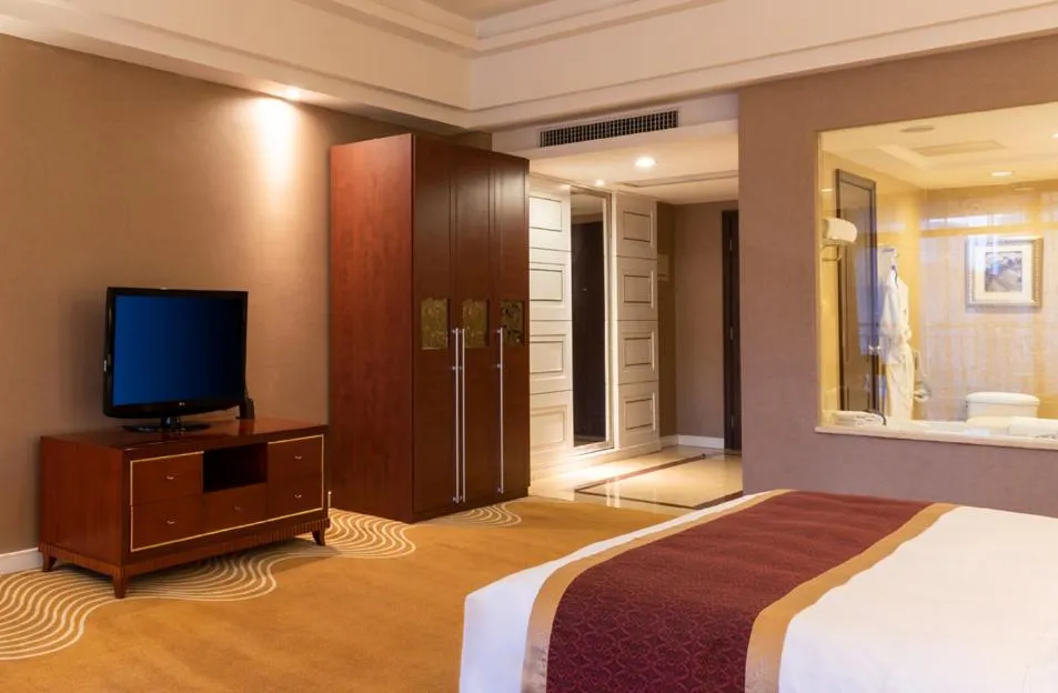 Bed in Country Garden Phoenix Hotels Shenyang Yuhong