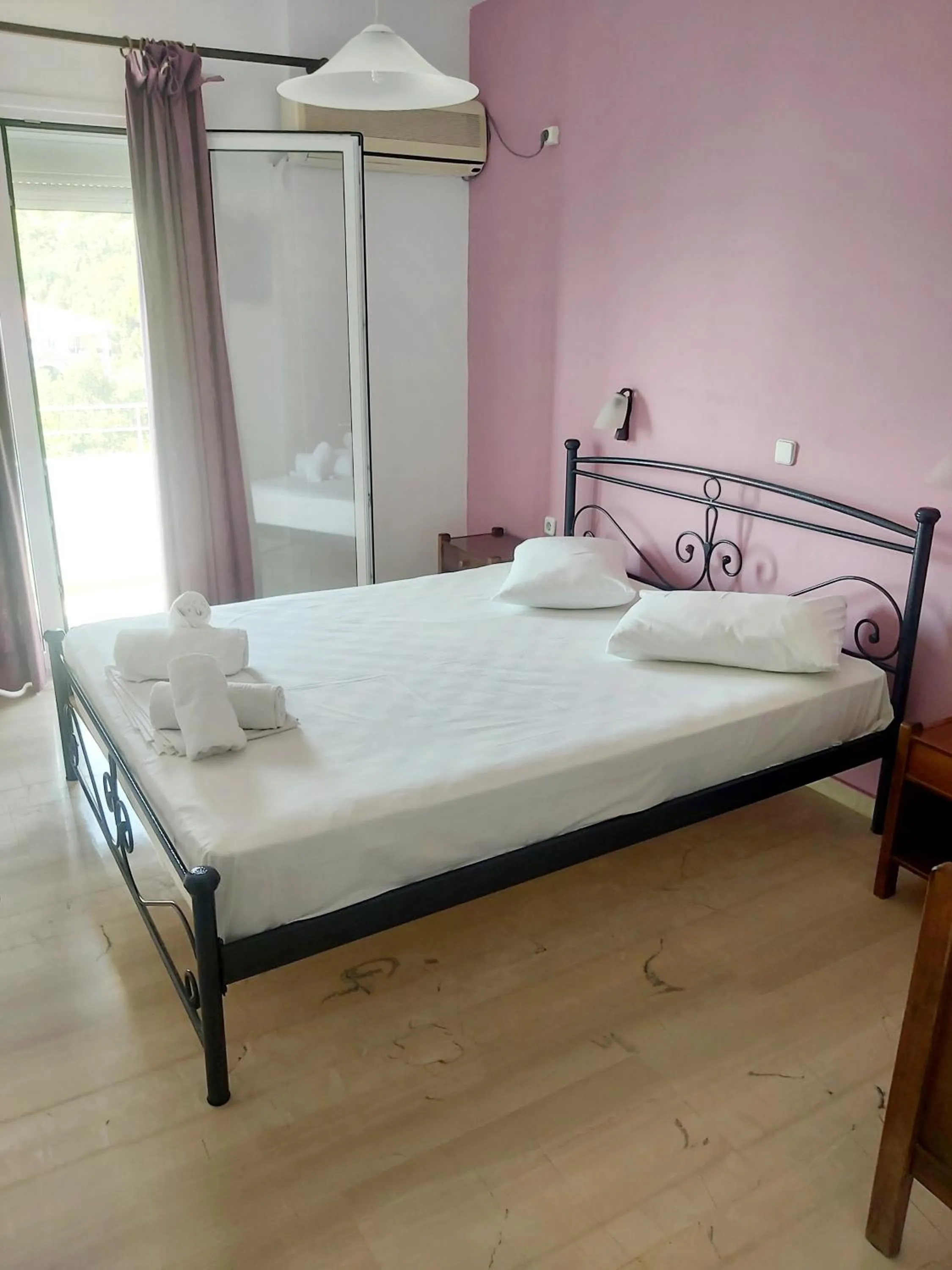 Bed in Filoxenia Hotel & Apartments
