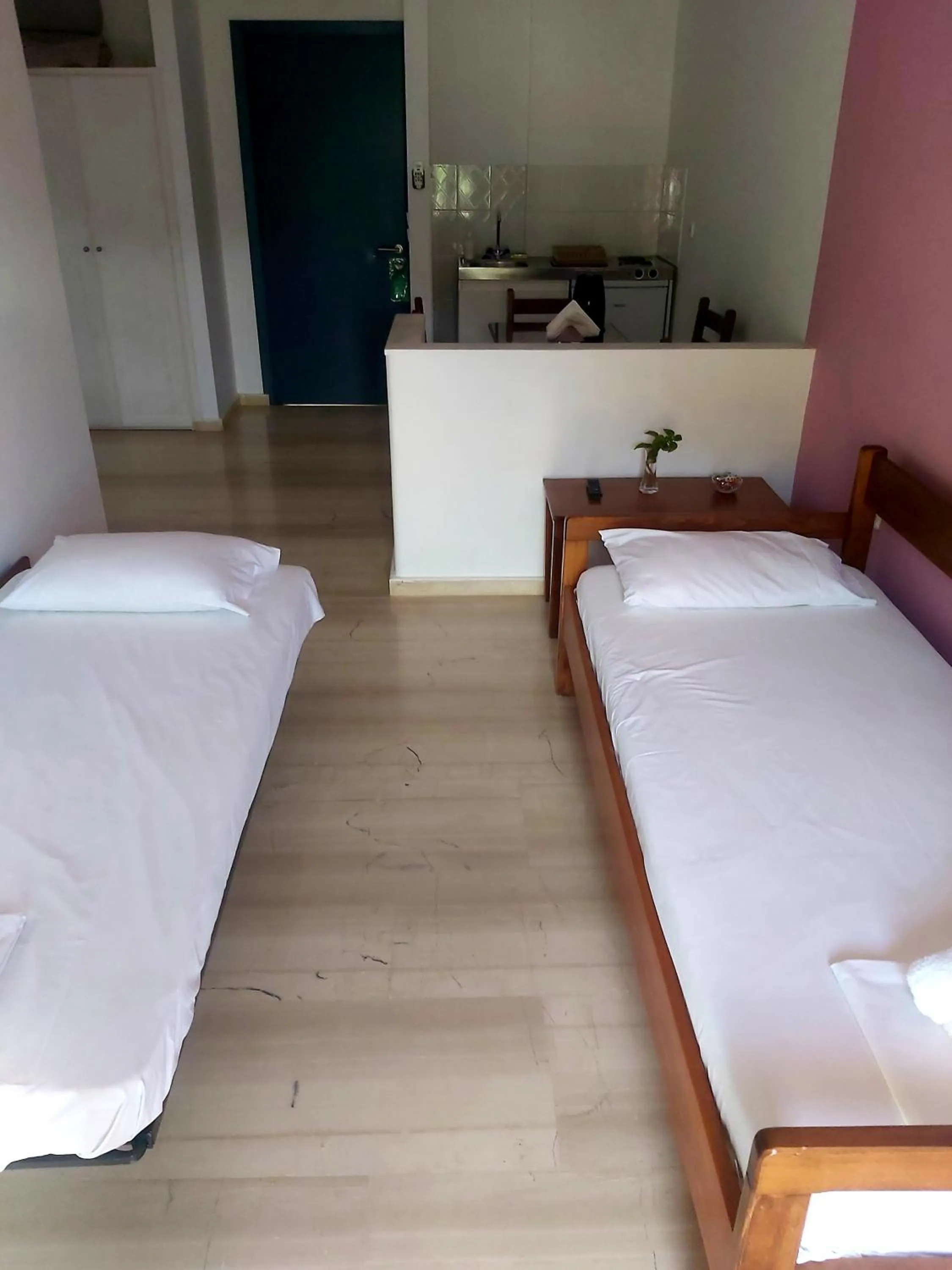 Bed in Filoxenia Hotel & Apartments